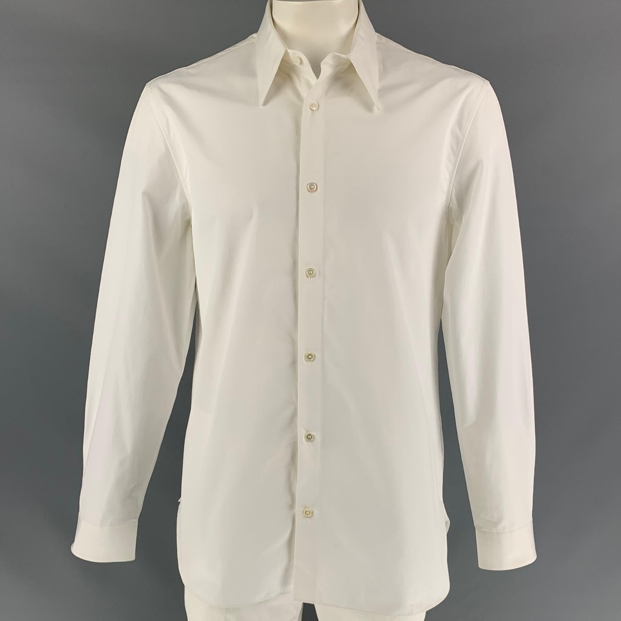 CALVIN KLEIN 205W39NYC long sleeve shirt comes in a white cotton with a back red & black graphic print of Andy Warhol featuring a pointed collar and a button up closure. Made in Italy. 

Very Good Pre-Owned Condition.
Marked: