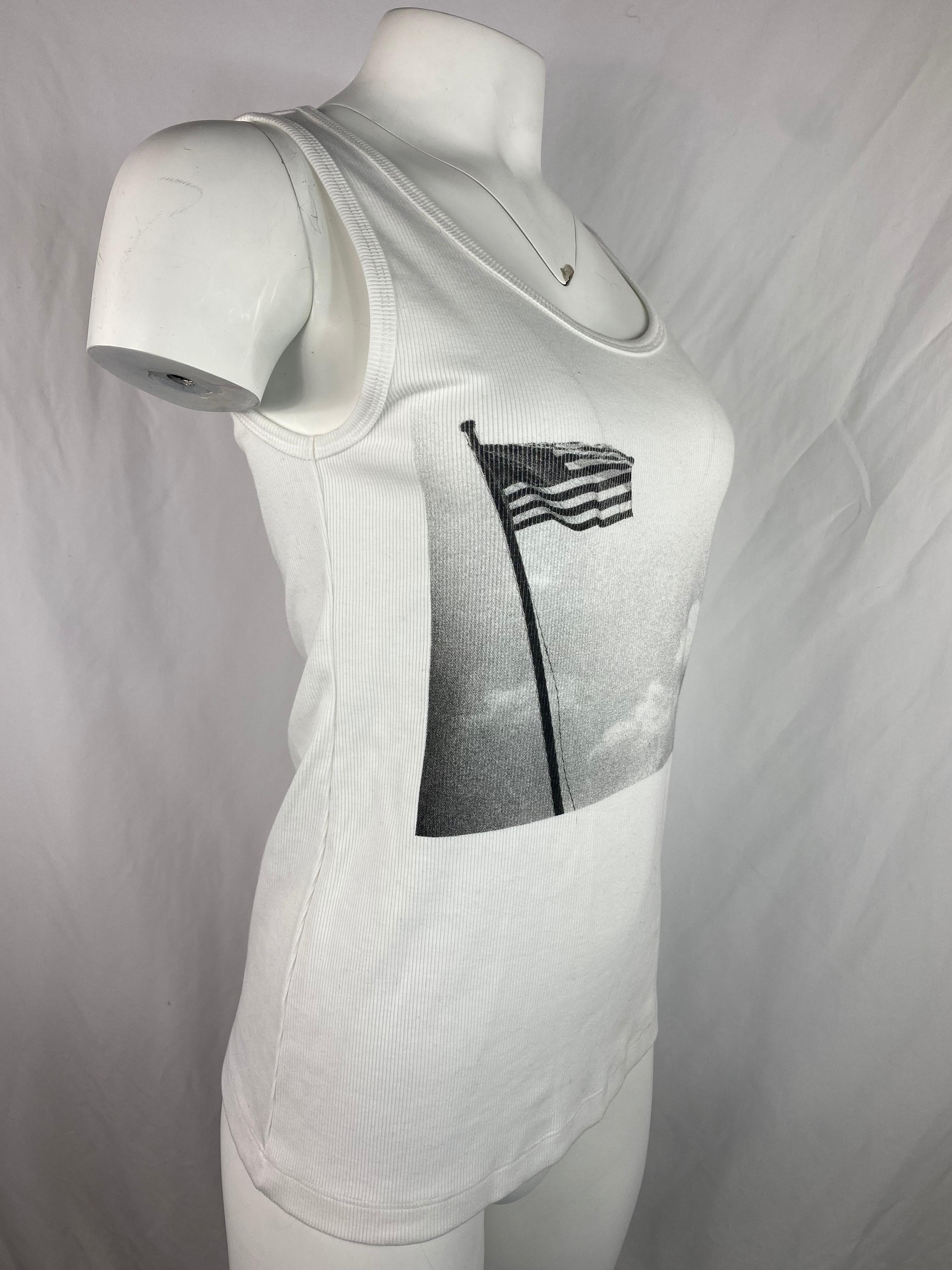 Product details:

The top features black and white American Flag, 1983 print on the front.