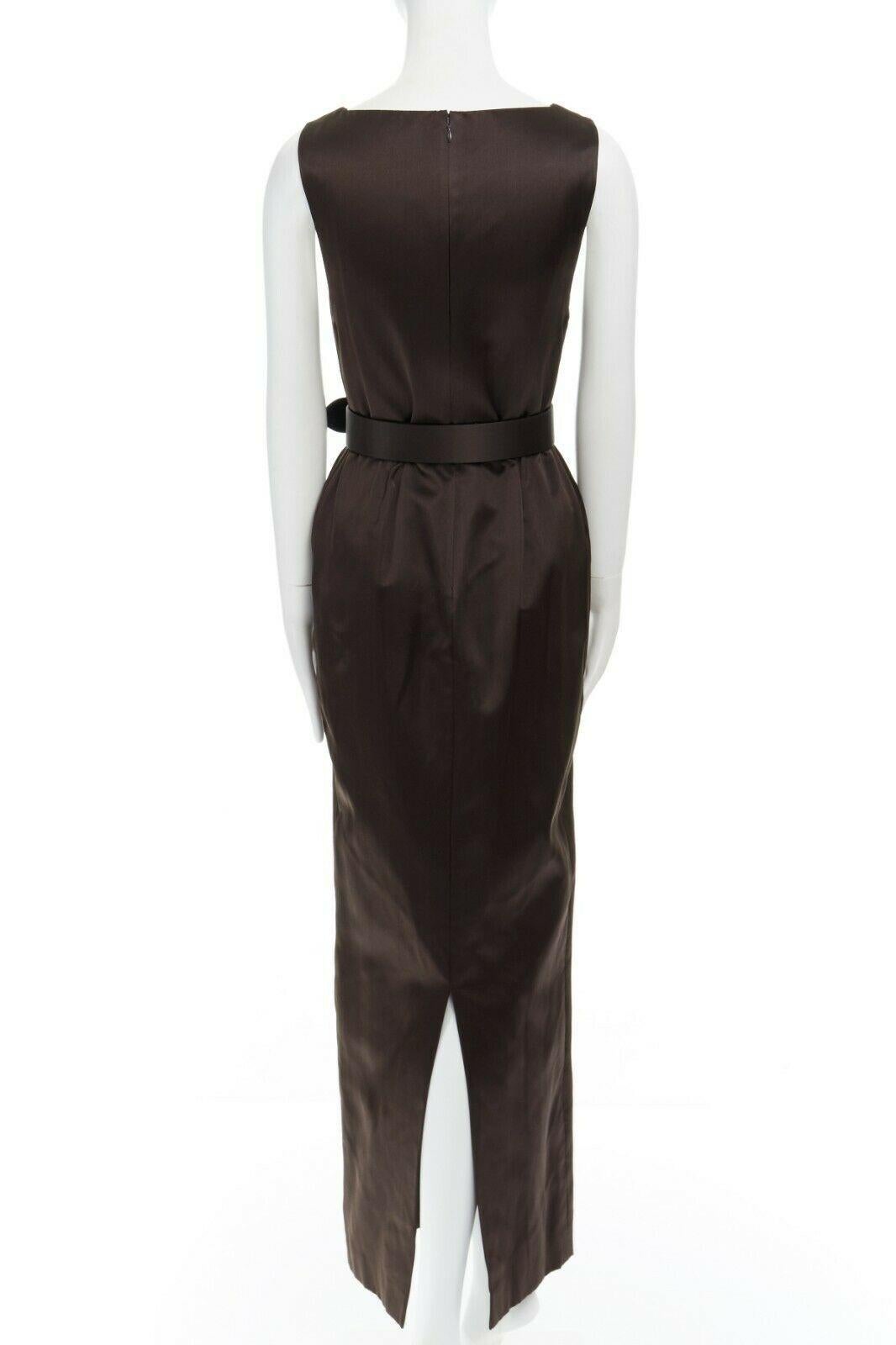 CALVIN KLEIN COLLECTION 100% silk dark brown bateau neck belted column dress US4

CALVIN KLEIN COLLECTIONS
100% silk. Dark brown. Bateau neckline. Sleeveless. Fitted waist. Removable silk belt. Concealed zip back closure. Column dress. Made in