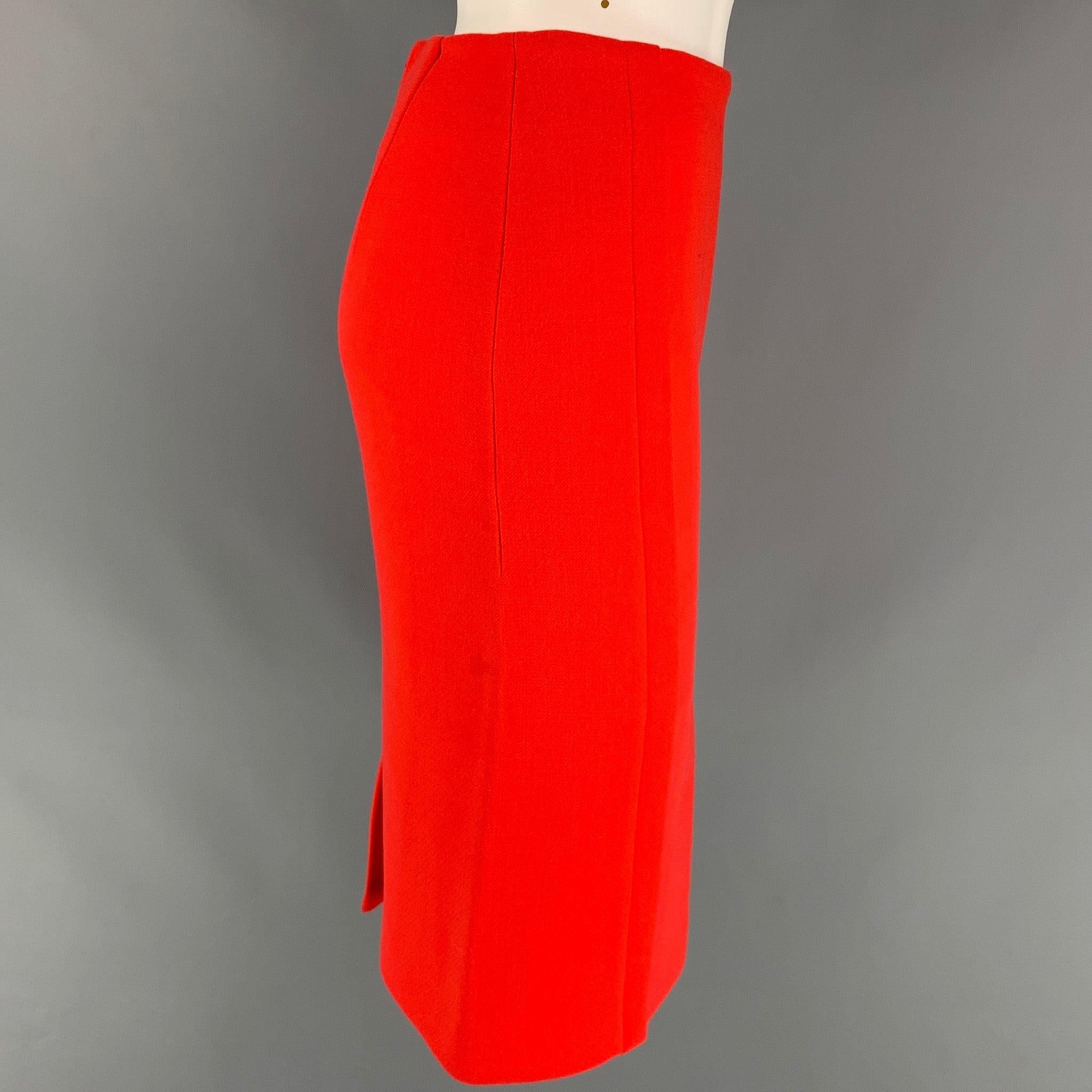 CALVIN KLEIN COLLECTION skirt in a orange wool with a full liner featuring a pencil style, high waisted, single back vent, and a back zip up closure. Made in Italy.
Very Good Pre-Owned Condition. Minor signs of wear. 

Marked:   0/36 

Measurements: