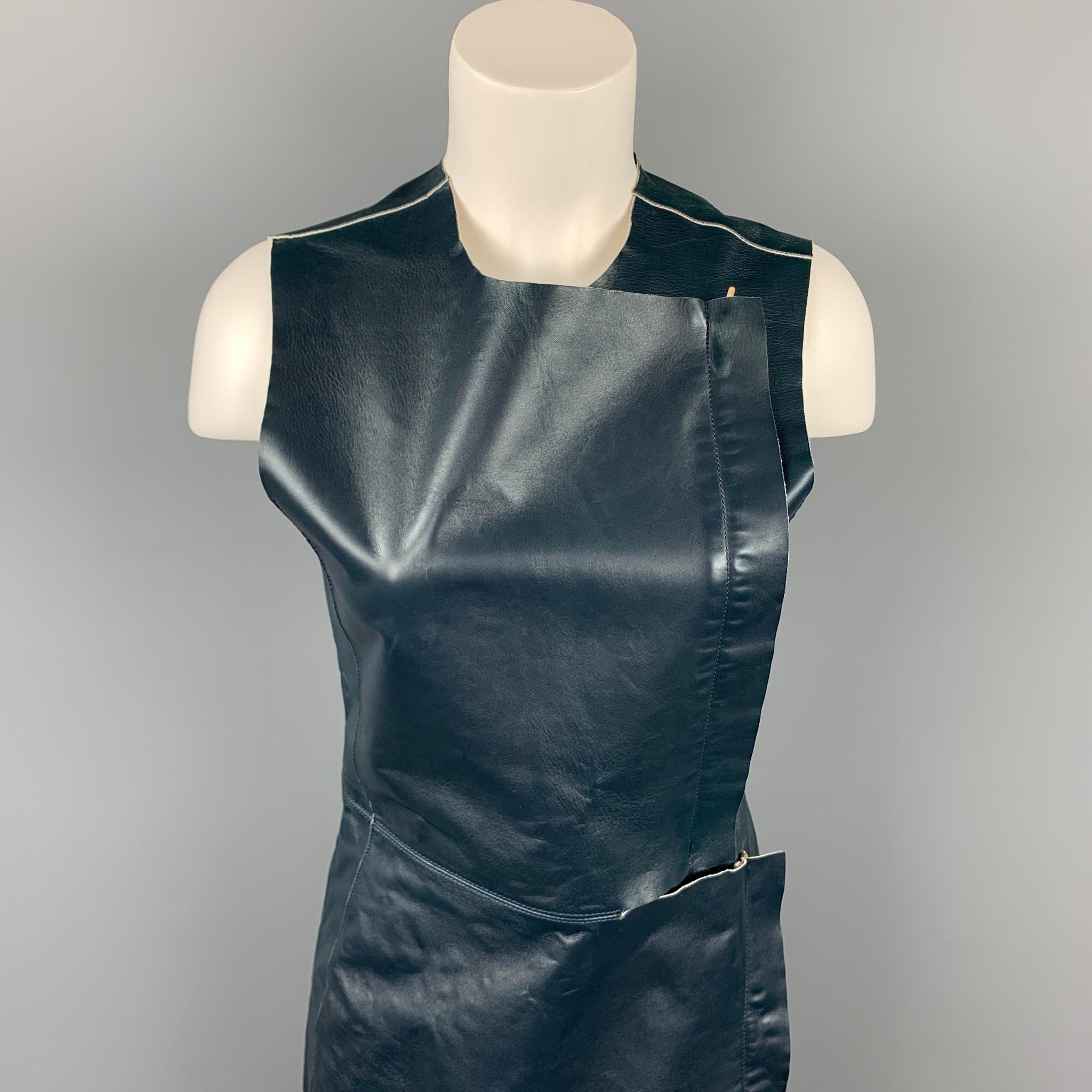 CALVIN KLEIN COLLECTION dress comes in a dark blue leather featuring a sheath style and zipper closure details. Made in Italy.

New With Tags.
Marked:

Measurements:

Bust: 30 in.
Waist: 28 in.
Hip: 34 in.
Length: 33 in.