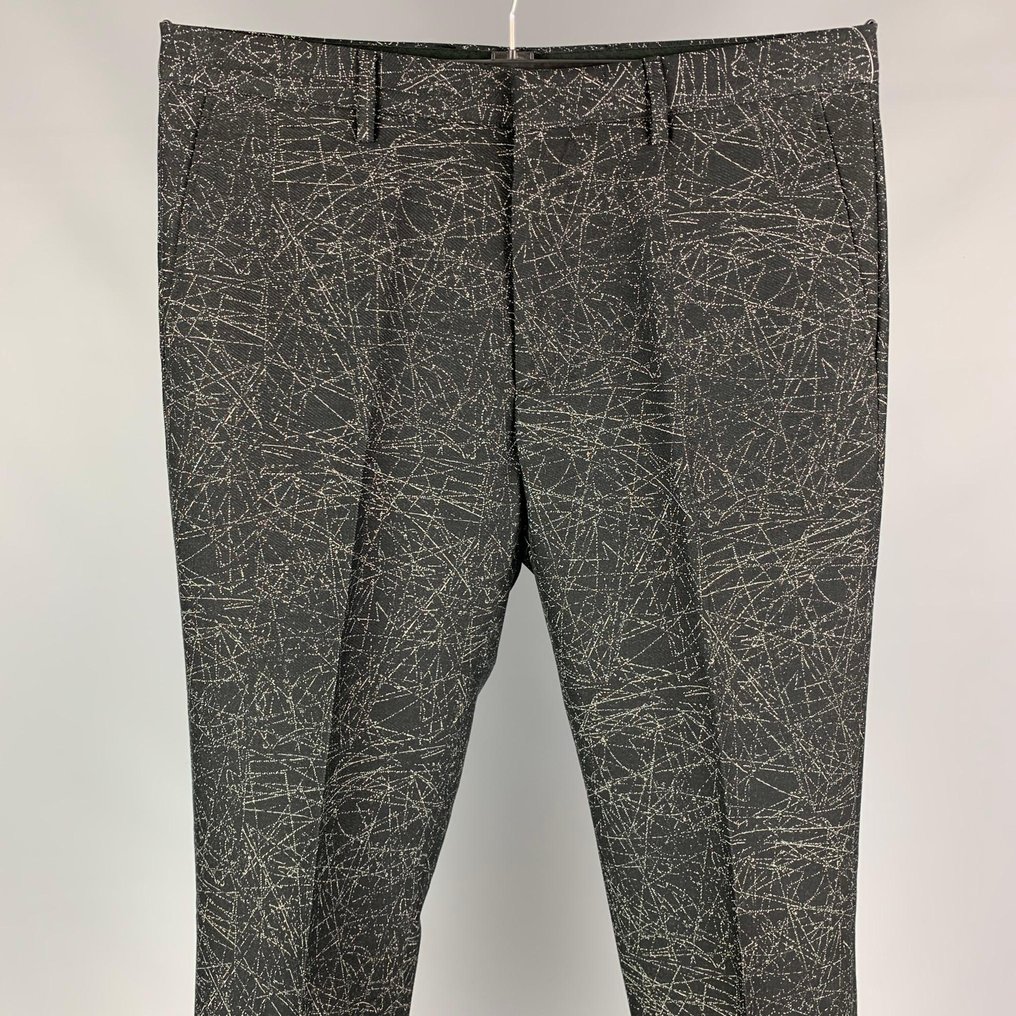 CALVIN KLEIN COLLECTION tuxedo dress pants comes in a black & grey print wool / cotton featuring a flat front, slit pocket, front tab, and a zip fly closure. 

Very Good Pre-Owned Condition.
Marked: 32/33

Measurements:

Waist: 33 in.
Rise: 10.5