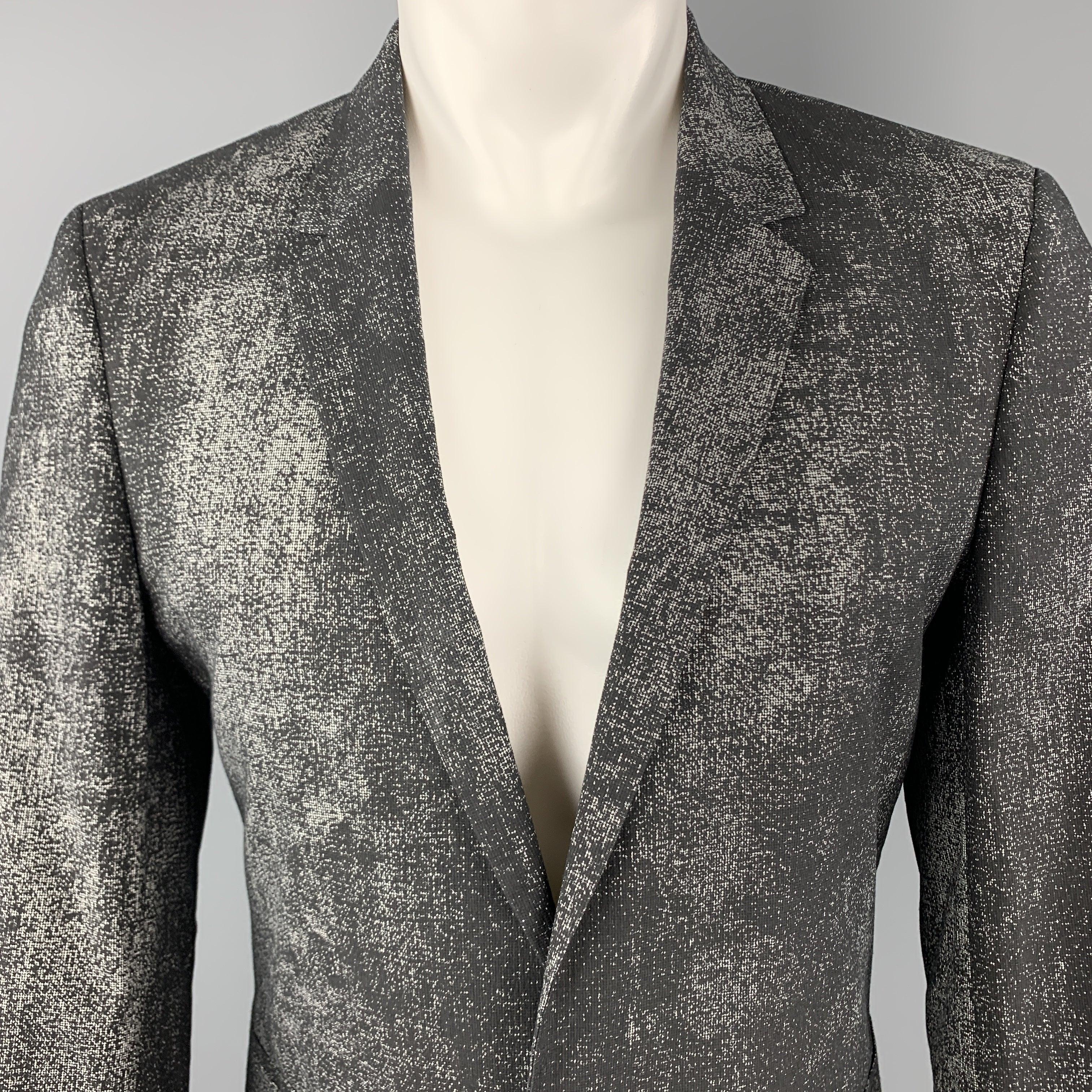 CALVIN KLEIN COLLECTION
sport coat comes in distressed painted print black and gray fabric with a notch lapel, single breasted, one button front, and double vented back.
Excellent Pre-Owned Condition. 

Marked:   IT 46 

Measurements: 
 
Shoulder: