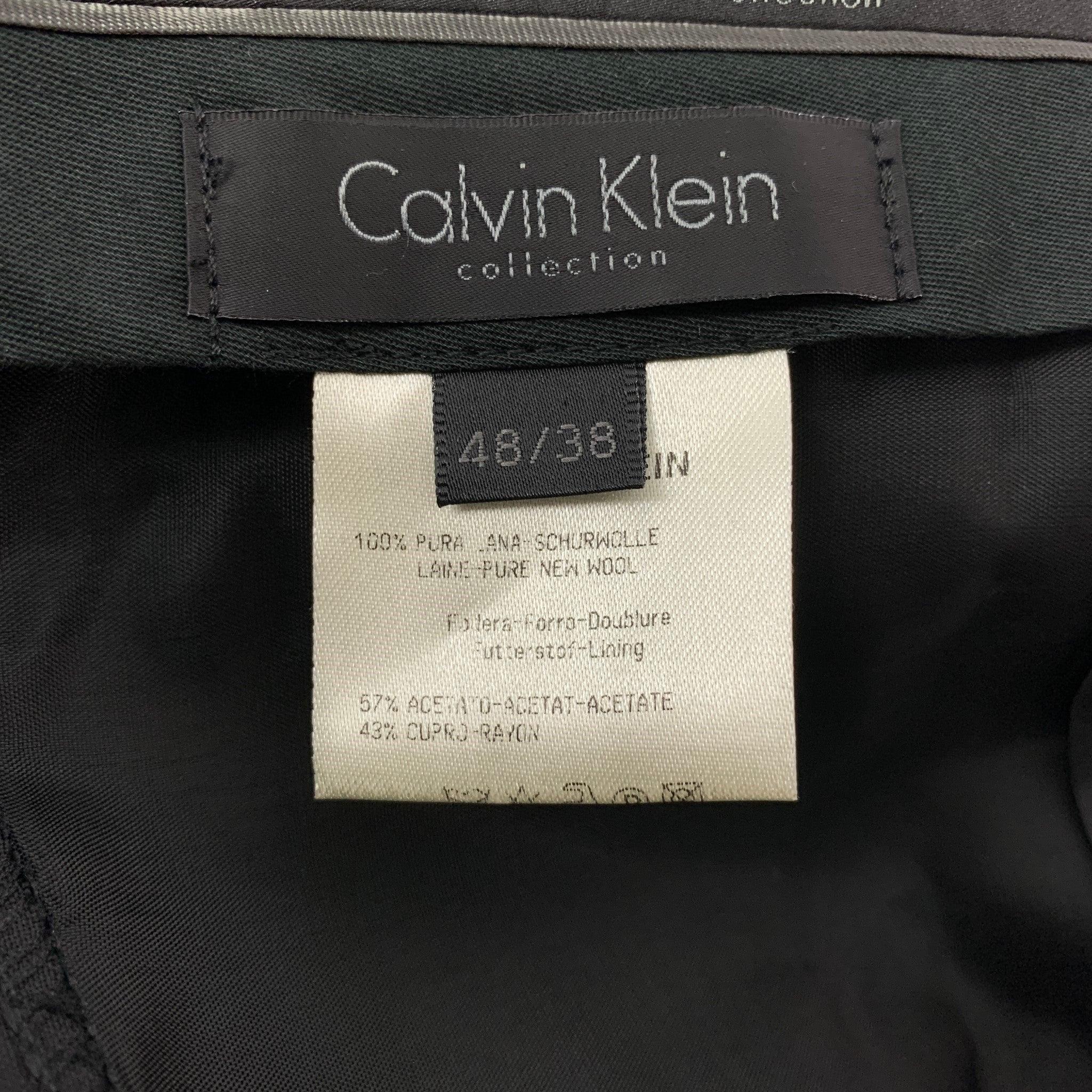 CALVIN KLEIN COLLECTION - Costume en laine noire à revers clouté, taille 38 en vente 6