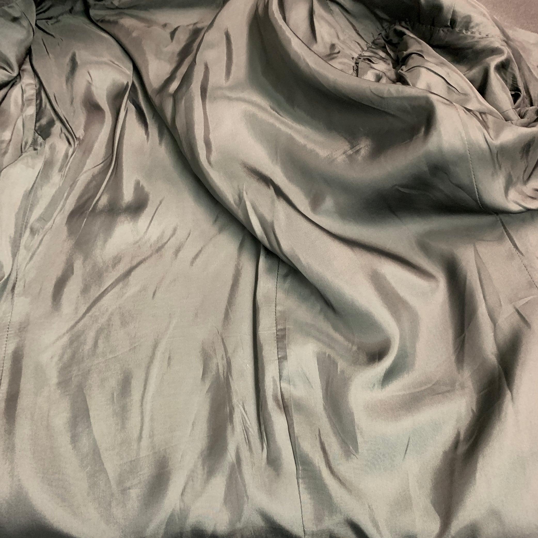CALVIN KLEIN COLLECTION Taille 44 - Manteau de sport en laine noire à revers clouté en vente 1