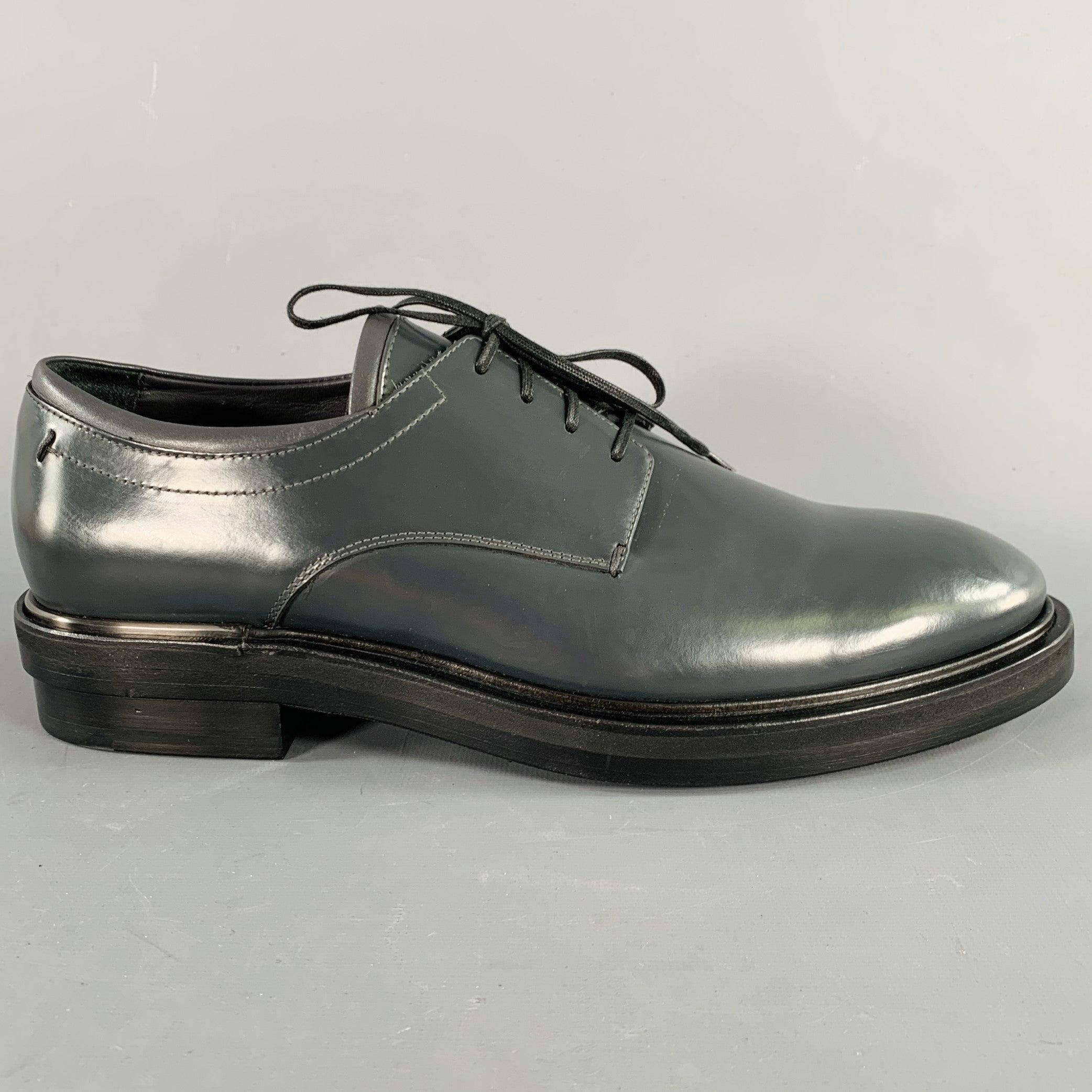 CALVIN KLEIN COLLECTION shoes
in a grey leather featuring a derby style, rubber sole, and lace-up closure Comes with box. Made in Italy.Excellent Pre-Owned Condition. 

Marked:   IT 42Outsole: 11.5 inches  x 4 inches 
  
  
 
Sui Generis Reference: