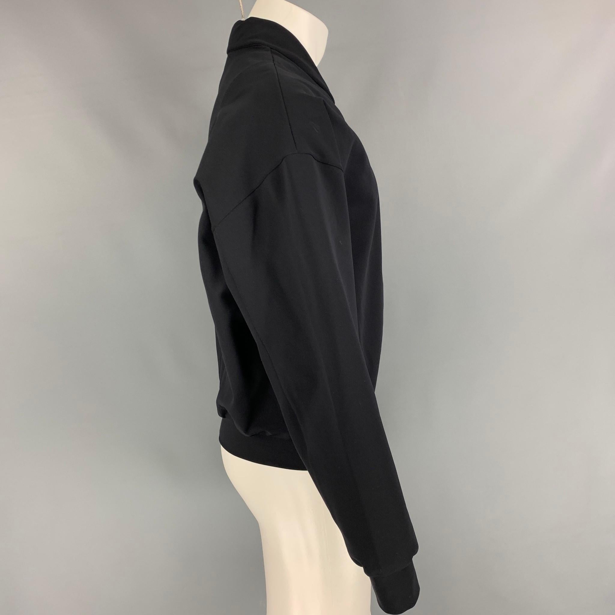 CALVIN KLEIN COLLECTION jacket comes in a black polyamide featuring a bomber style, slit pockets, loose fit, and a full zip up closure. Made in Italy. 

Excellent Pre-Owned Condition.
Marked: M

Measurements:

Shoulder: 25 in.
Chest: 50 in.
Sleeve: