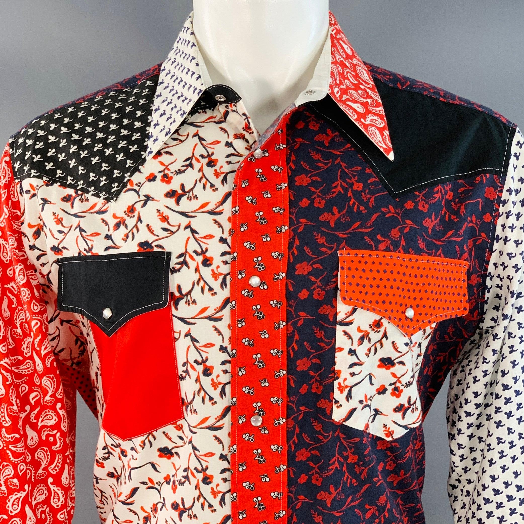 Camisa de manga larga CALVIN KLEIN COLLECTION
en un tejido de algodón multicolor con un estilo occidental, diseño patchwork con estampados mixtos de bandana y cierre a presión.Excelente estado de segunda mano. 

Marcado:   IT 48 

Medidas: 
 
Hombro