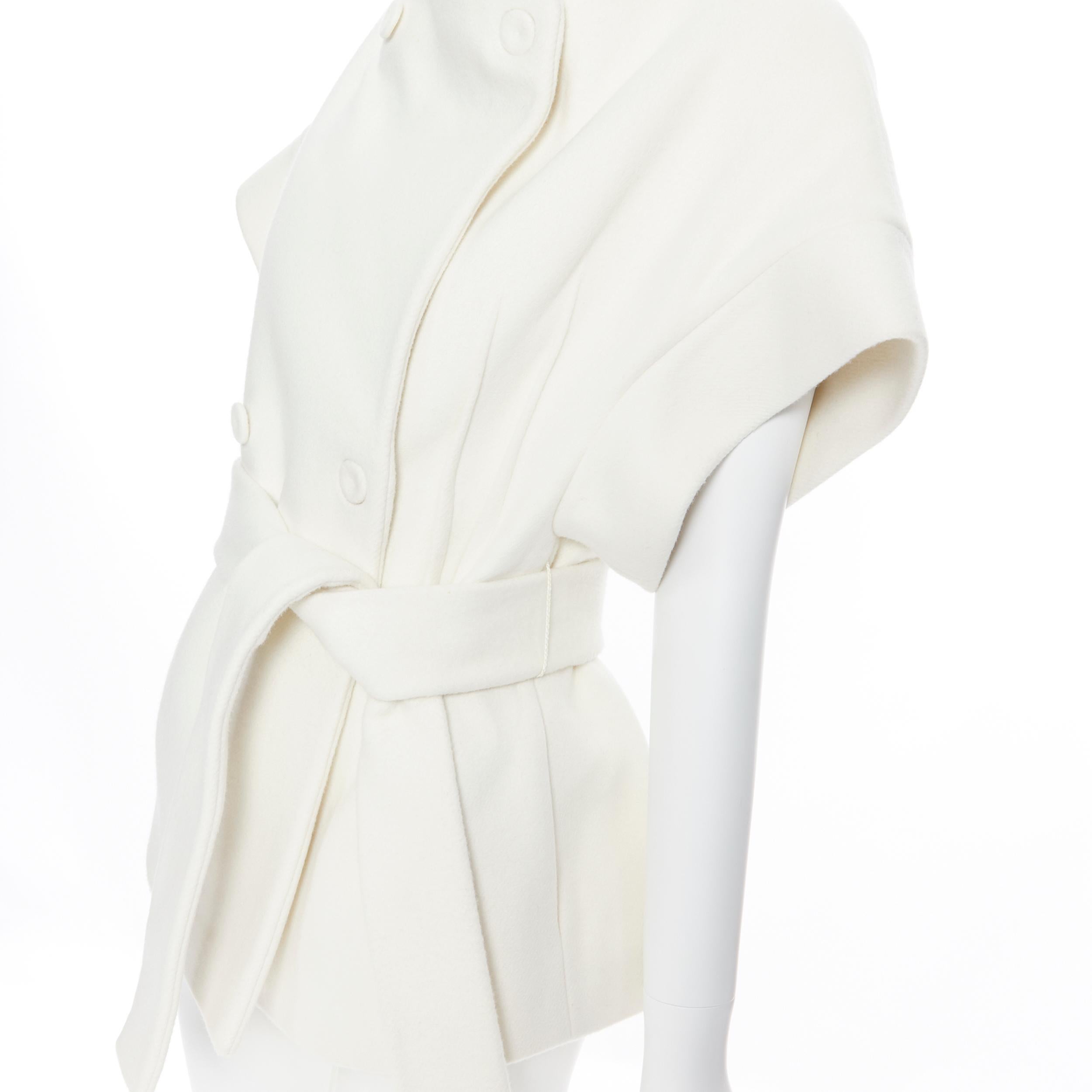 CALVIN KLEIN COLLECTIONS white wool reversed seam belted cocoon coat IT36 XS
Brand: Calvin Klein Collections
Model Name / Style: Wool coat
Material: Wool
Color: White
Pattern: Solid
Extra Detail: Exposed pinched seams at waist for fit. Sunken tonal