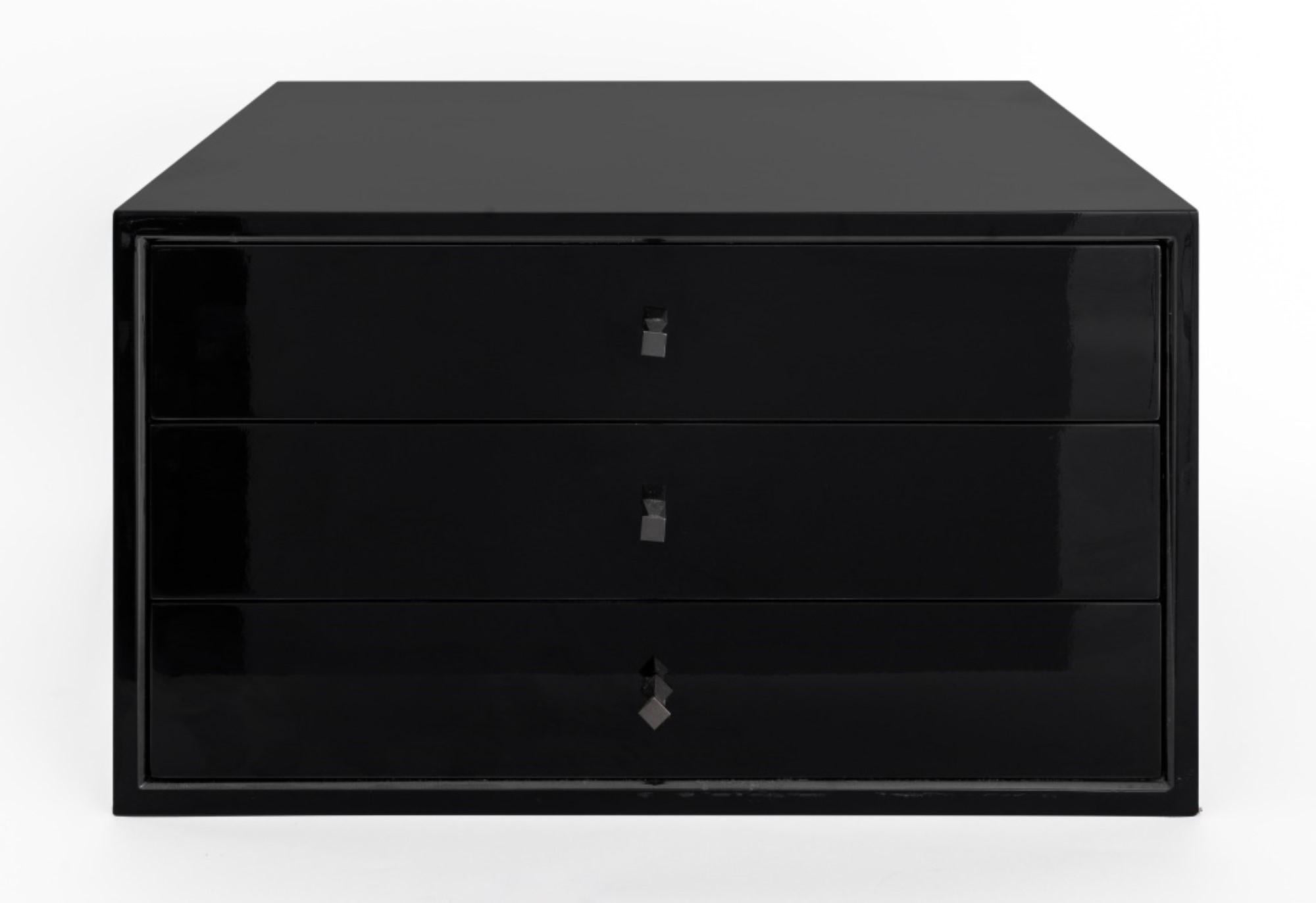  Calvin Klein Curator Collection black lacquered three-drawer side table or storage chest. Here are the specifications:

Collection: Calvin Klein Curator Collection
Color: Black lacquered
Type: Three-drawer side table/storage chest

Dealer: S138XX