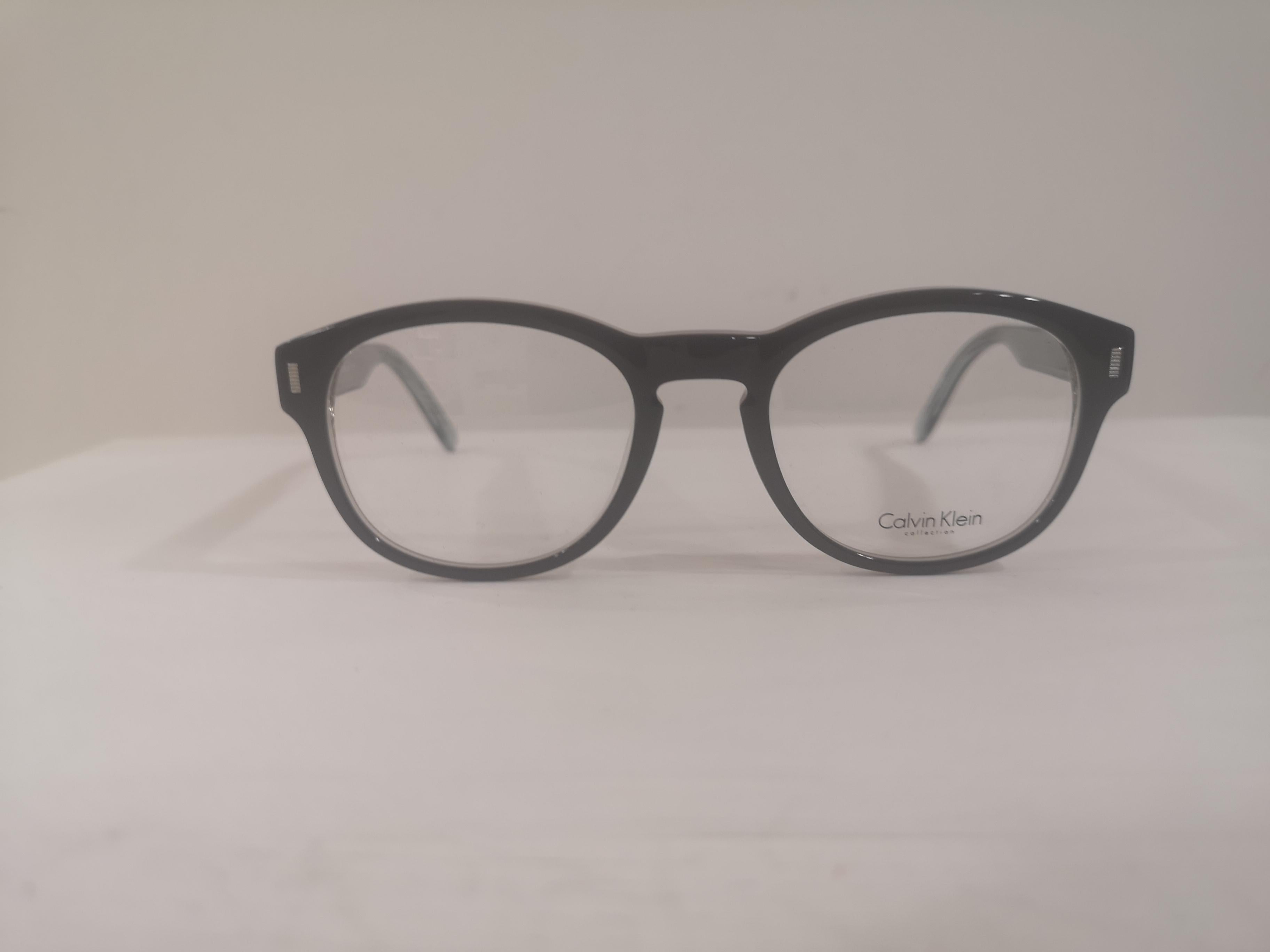 Gris Calvin Klein lunettes/cadrements à monture, neuves avec étiquette en vente