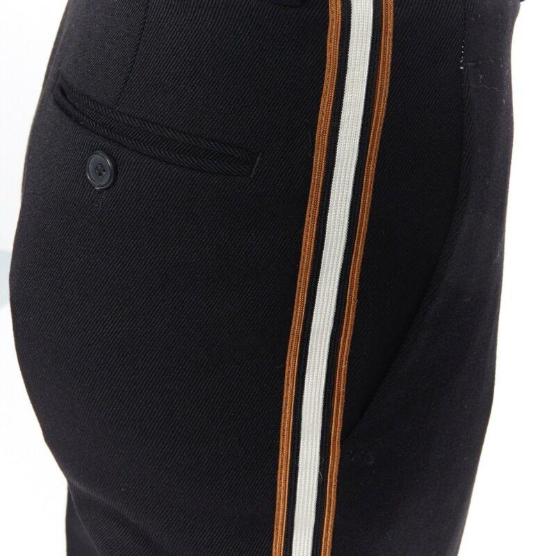 CALVIN KLEIN Raf Simons 2018 black white gold trim straight leg trousers US0 XXS
Reference: CLYG/A00023
Brand: Calvin Klein
Designer: Raf Simons
Collection: Fall Winter 2018
Material: Wool
Color: Black
Pattern: Solid
Closure: Zip
Extra Details:
