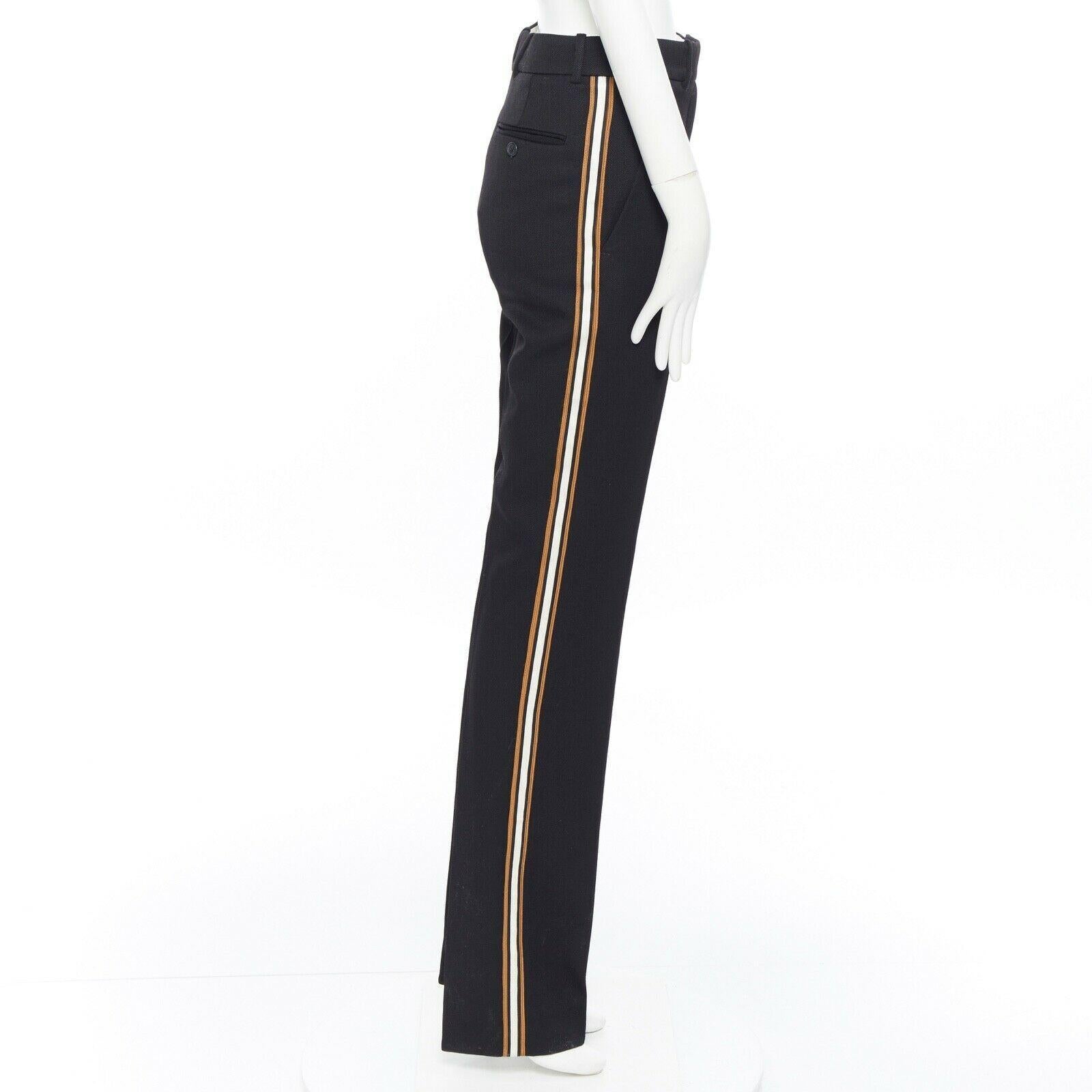 black pants with gold stripe