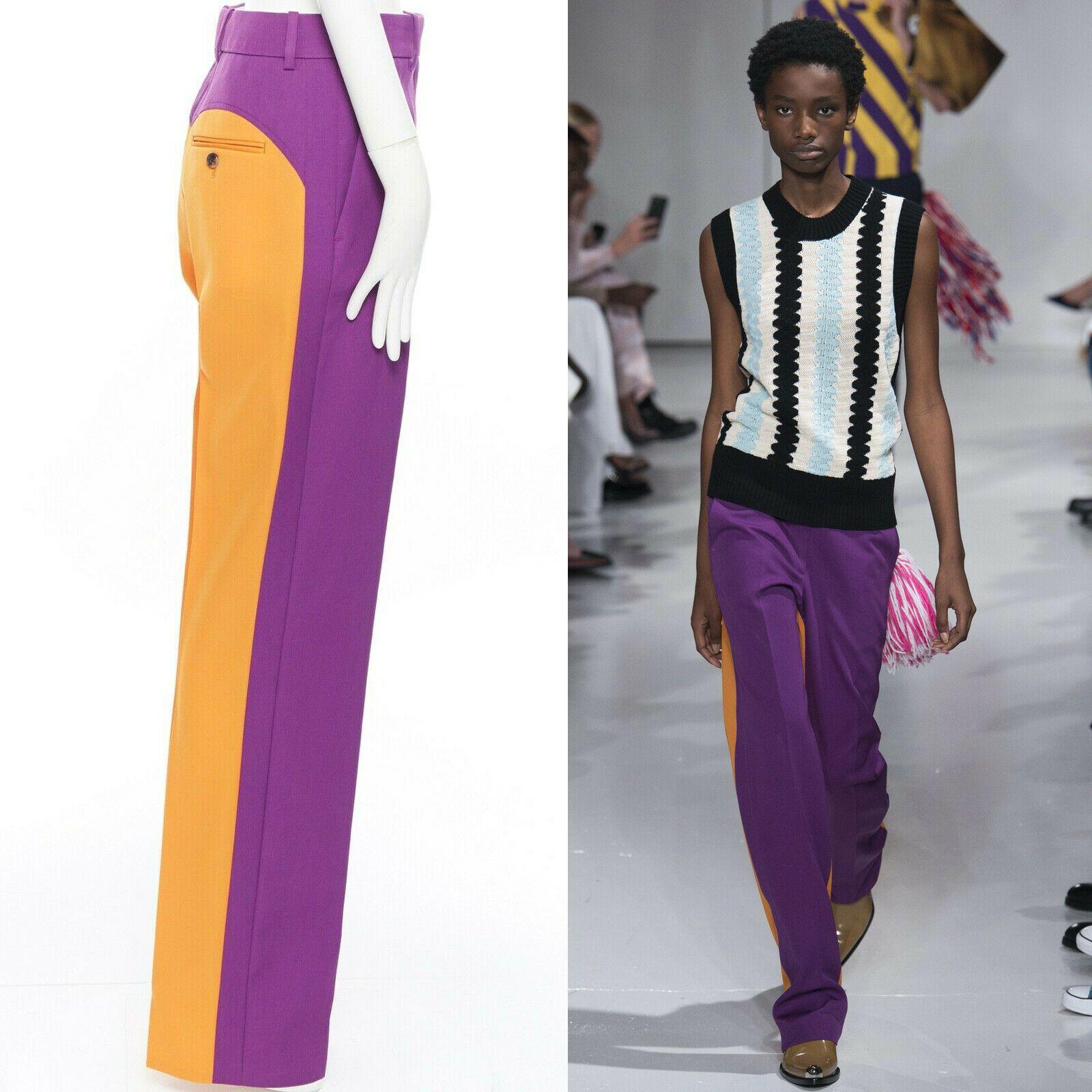 CALVIN KLEIN RAF SIMONS SS18 purple orange colour-block straight trousers US2 XS

Designer: CALVIN KLEIN 205W39NYC BY RAF SIMONS
Model / Season: Spring / Summer 2018
Material: wool
Color: ultraviolet
Pattern: graphic
Description: Tailored straight