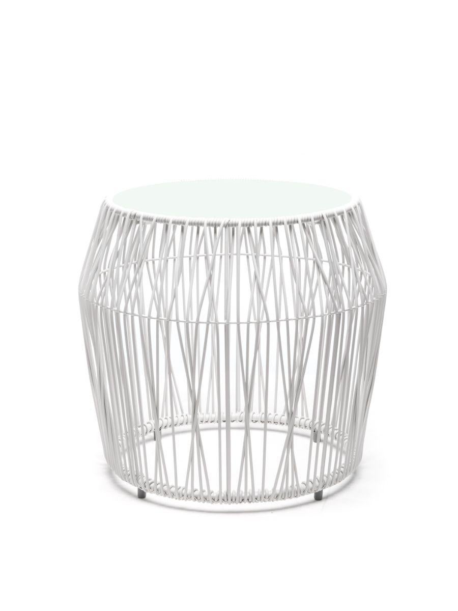 Calyx end table by Kenneth Cobonpue
Materials: Polyethelene steel. 
Dimensions: diameter 54.5 cm x height 50cm 
Like the lustrous diamond, Calyx features a matrix of interwoven polyethylene strands and a wide crown, making any space stylish with