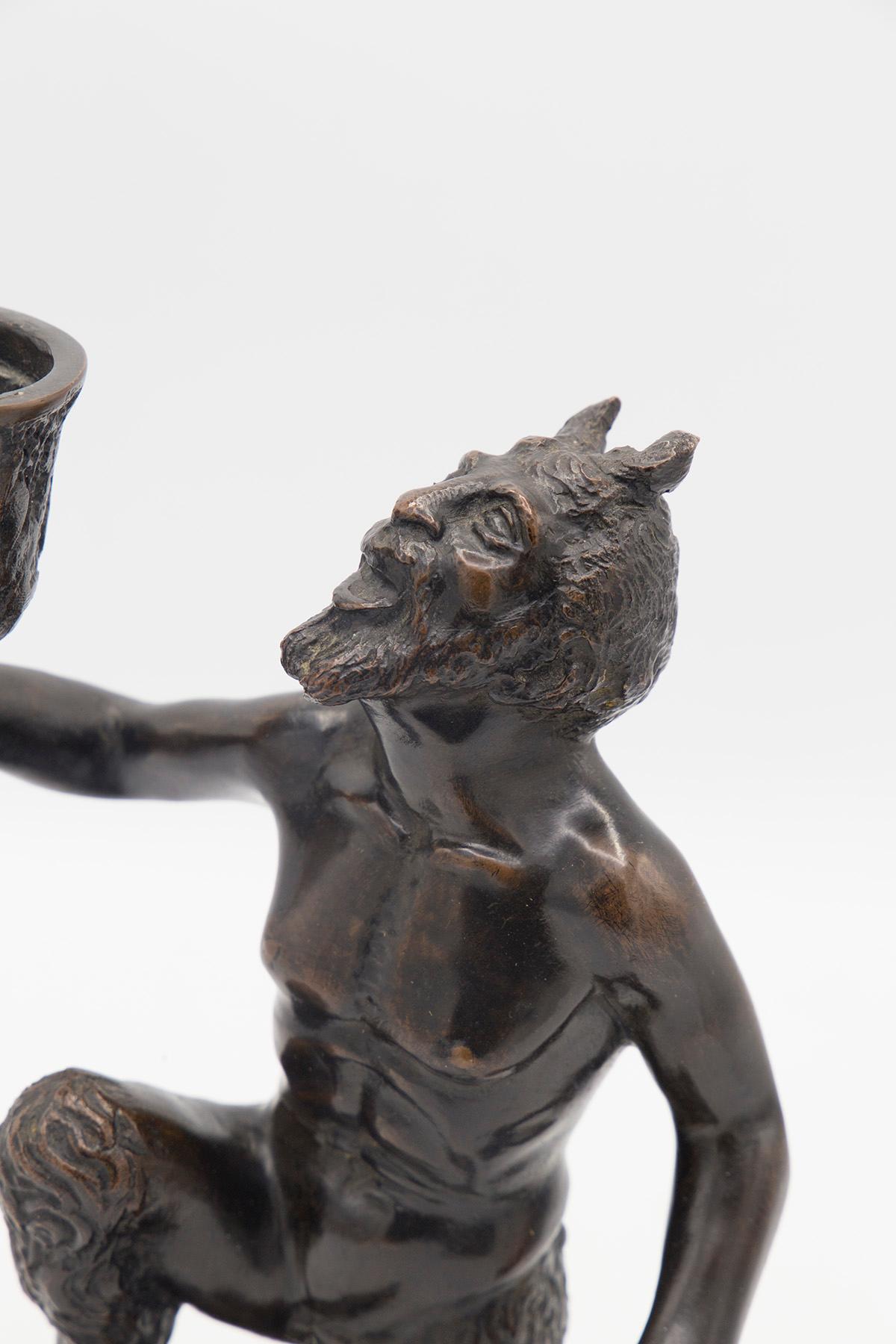 Bronze Calzetta Da Ravenna Severo Candlestick Depicting a Kneeling Satyr For Sale