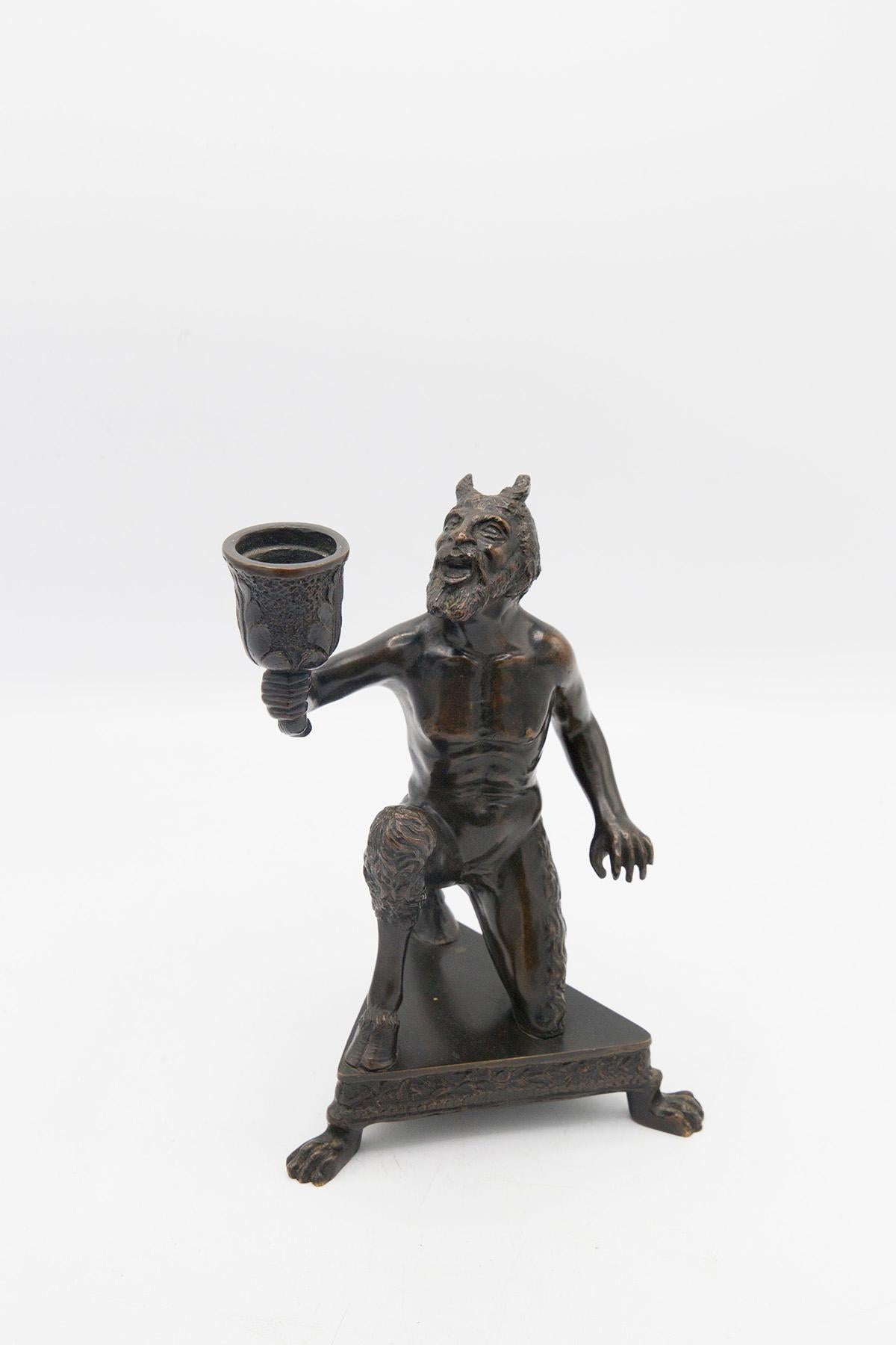 Calzetta Da Ravenna (Attivo Tra IL 1496 E IL 1543 circa) Severo. Circle of. Candlestick depicting a kneeling satyr. 
The model of the present bronze is the 