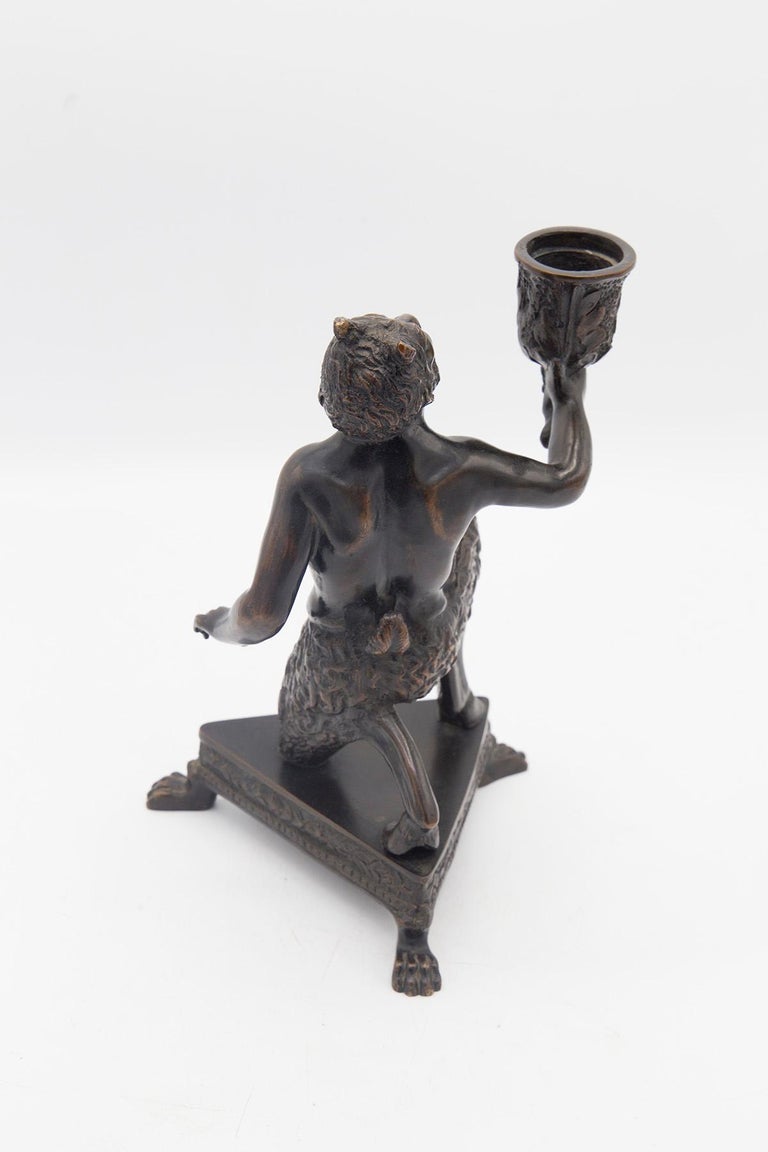Bronze Calzetta Da Ravenna Severo Candlestick Depicting a Kneeling Satyr For Sale