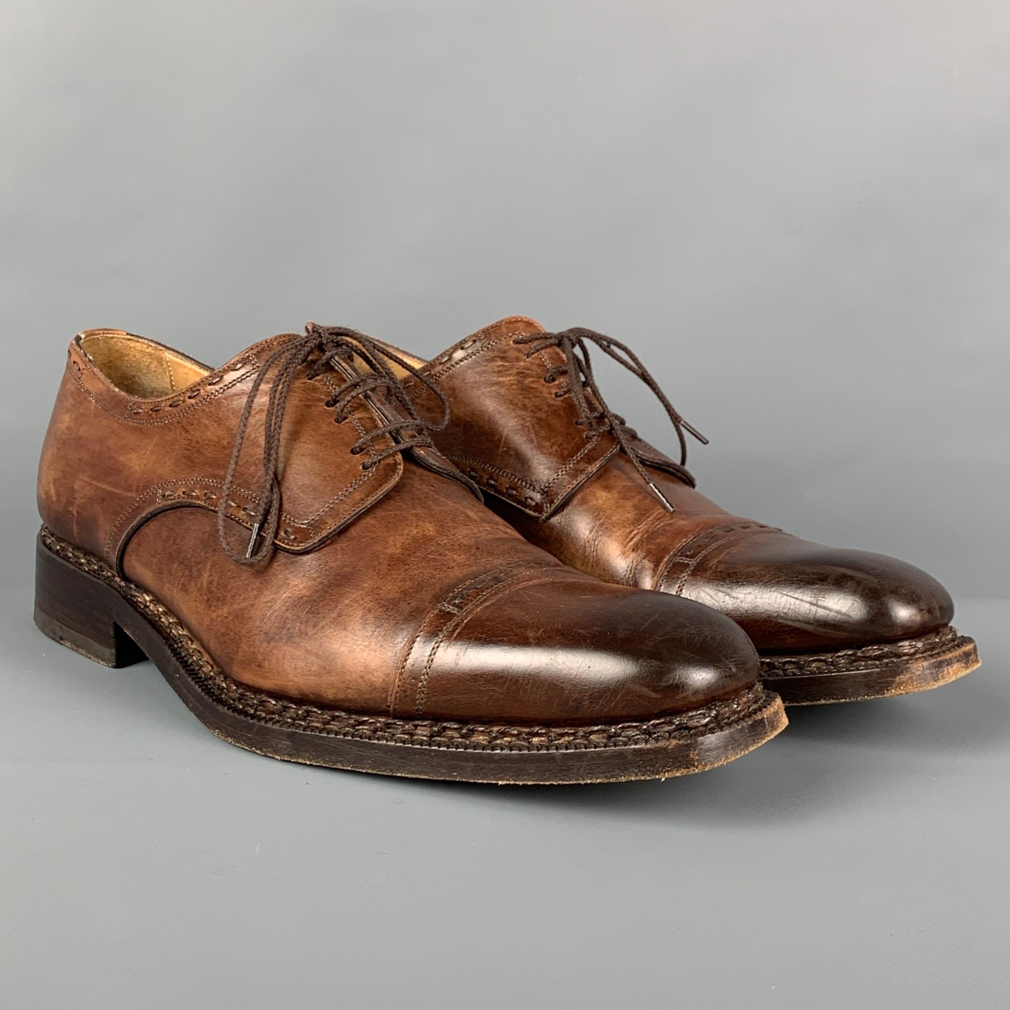 CALZOLERIA HARRIS x BARNEYS NEW YORK lace up shoes comes in a brown distressed leather featuring a cap toe and a lace up closure. Made in Italy.

Very Good Pre-Owned Condition.
Marked: 9916 8.5

Outsole: 12.25 in. x 4.25 in.