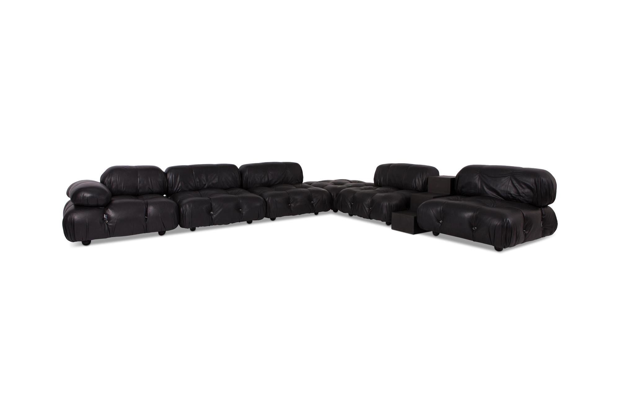 Mario Bellini modular camaleonda sofa in original high quality black leather upholstery, Italy — 1972.

The sofa consists out of six seating elements with different sizes of arm and back rests that are all provided with rings and carabiner clips