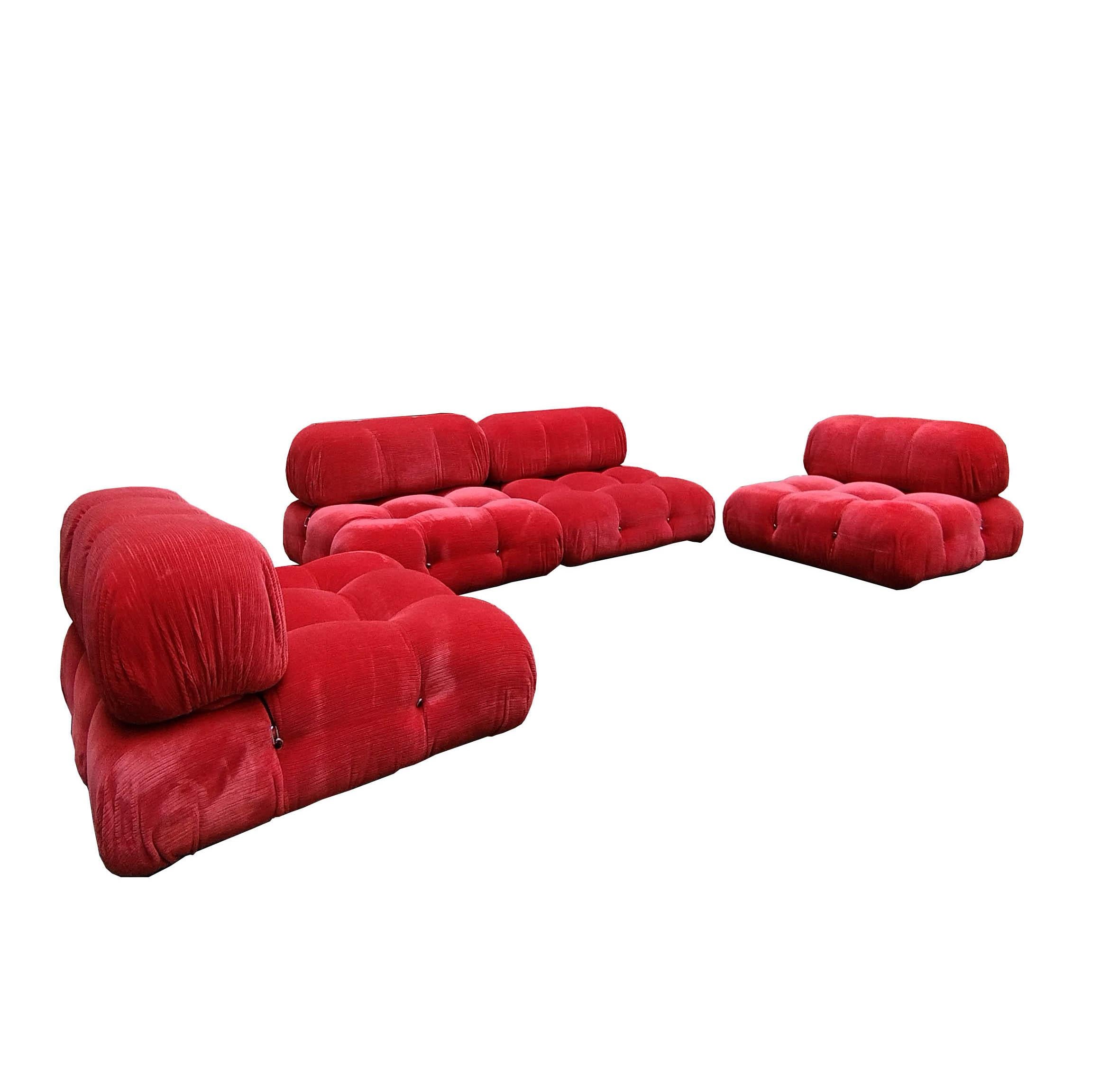 Mario Bellini, large modular sofa 'Cameleonda', red fabric covering, Italy, designed in 1971

The modular elements of this sofa can be used freely and separately from each other. The backrests and armrests are fitted with rings and snap hooks,