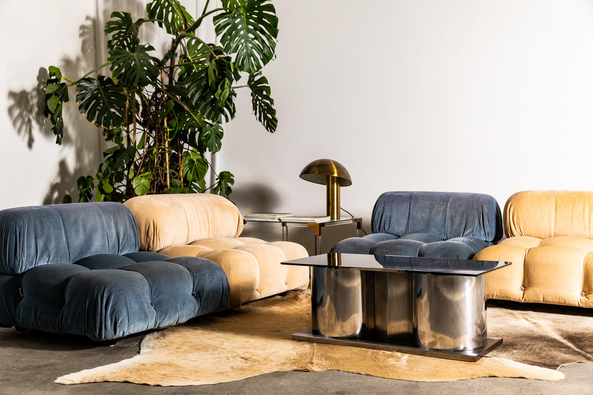 The Camaleonda modular sofa was designed by Italian architect Mario Bellini in 1971. This all original example has four sections and each of the modules attach with rings and carabiners, allowing several configurations. The design became famous