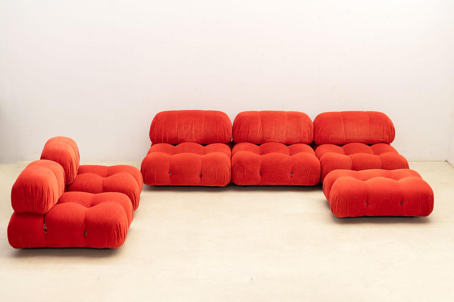 The Original Camaleonda modular sofa by Mario Bellini for B&B Italia is a renowned piece of furniture from the 1970s. 
It comprises three large and two smaller seating elements with backrests, along with one ottoman, all upholstered in the original