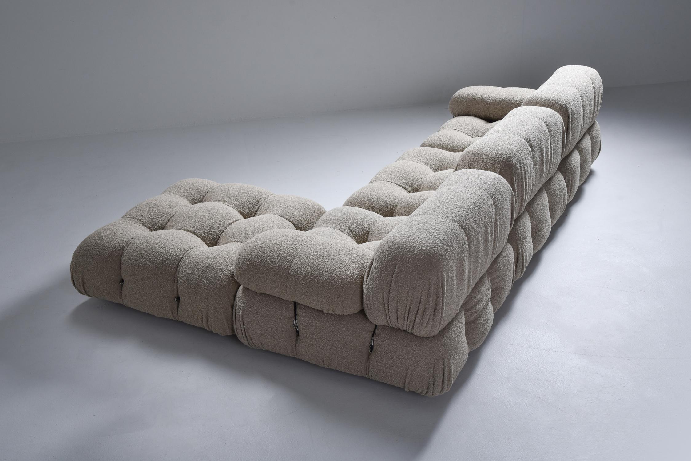 Postmodern modular couch by Mario Bellini in taupe bouclé for B&B Italia in the 1970s.
The entire sofa consists of 4 big seating elements, 3 backrests and 2 armrests. The couch has been reupholstered in a grey Bouclé wool. We can assemble your