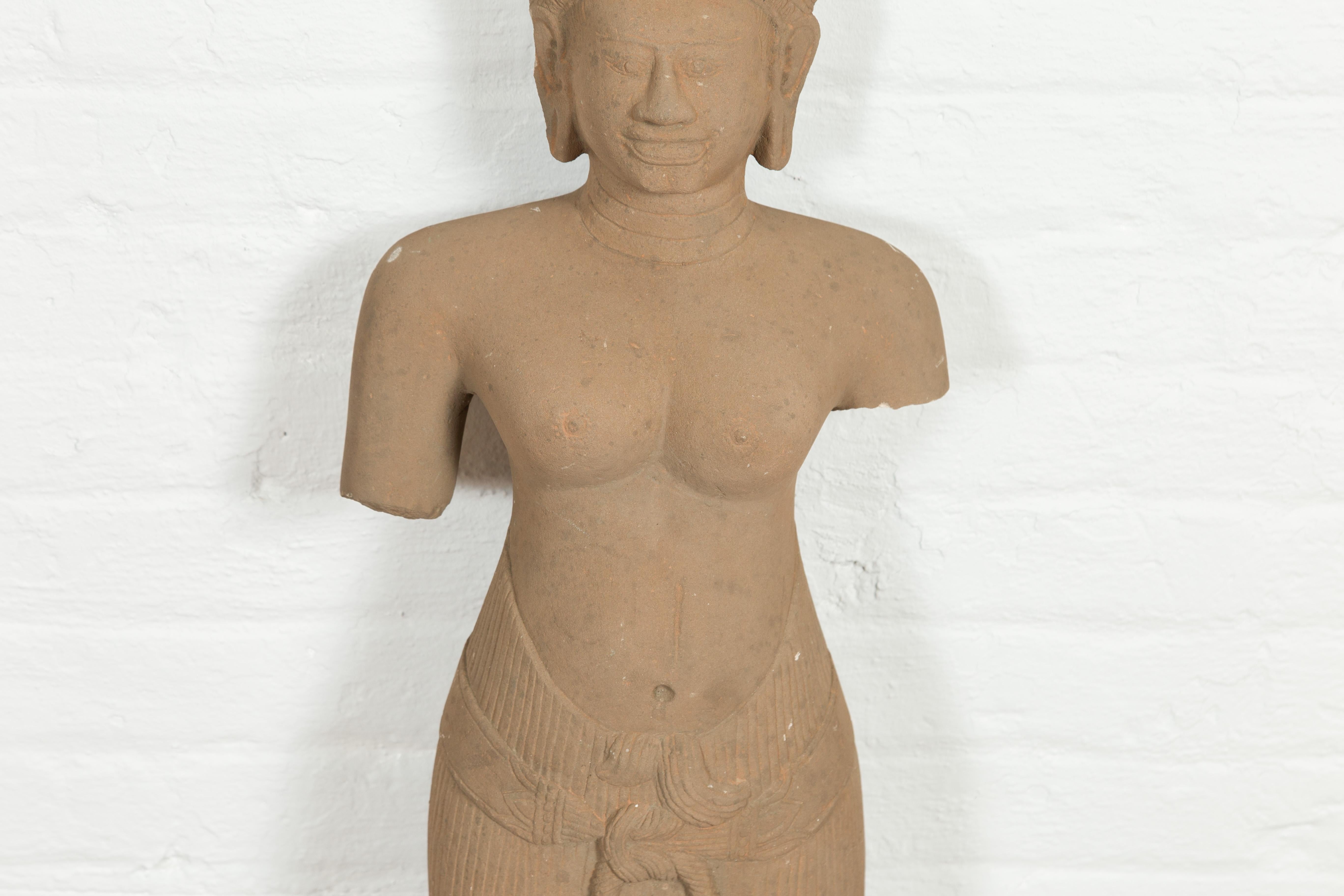 20th Century Cambodian Carved Stone Female Deity Bare-Chested Statue with Ornate Headdress