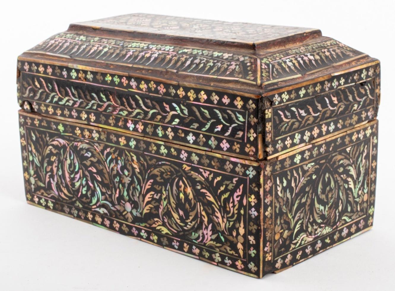 Antique Southeast Asian Cambodian mother of pearl inlaid black lacquered wood trinket box with cover. Provenance: From the collection of Le Lieu and Malcolm Browne (American, 1931-2012), the photojournalist who took the 1963 award-winning photograph