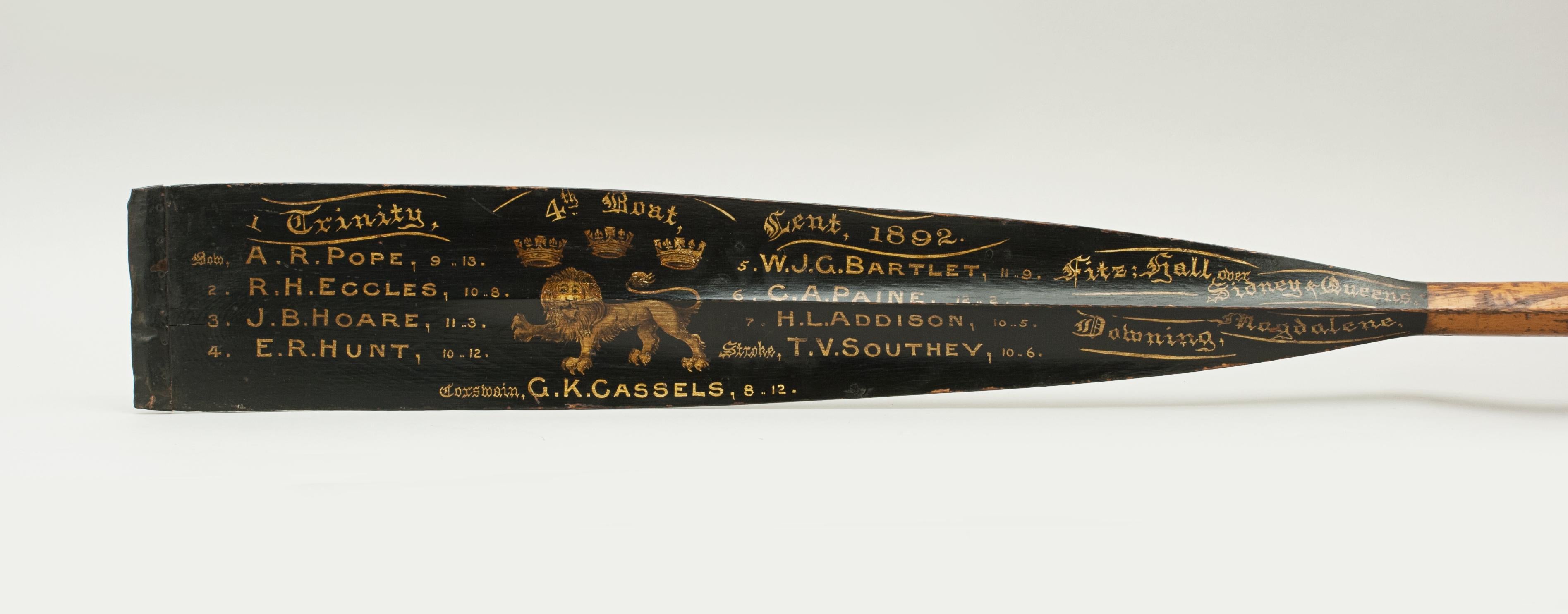 Cambridge presentation oar, trophy blade, 1892.
The 12 ft oar is an original traditional Trinity College (Cambridge University) presentation rowing oar with calligraphy and The 1st Trinity Boat Club insignia. The paint and writing on the trophy