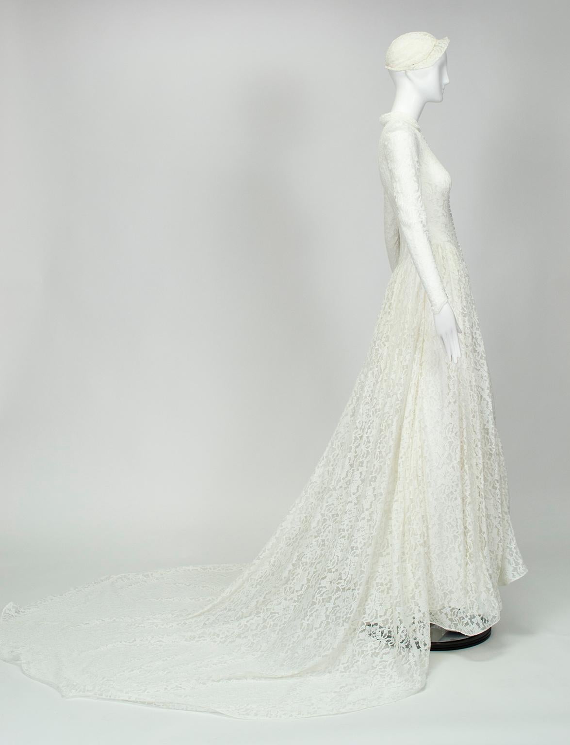 An alluring, yet fully-covered gown for those brides who seek modesty without looking mousy, this wedding gown was custom-made for a 1951 bride who valued discretion and beauty in equal measure. Though this gown pre-dates Kelly's, it is strikingly
