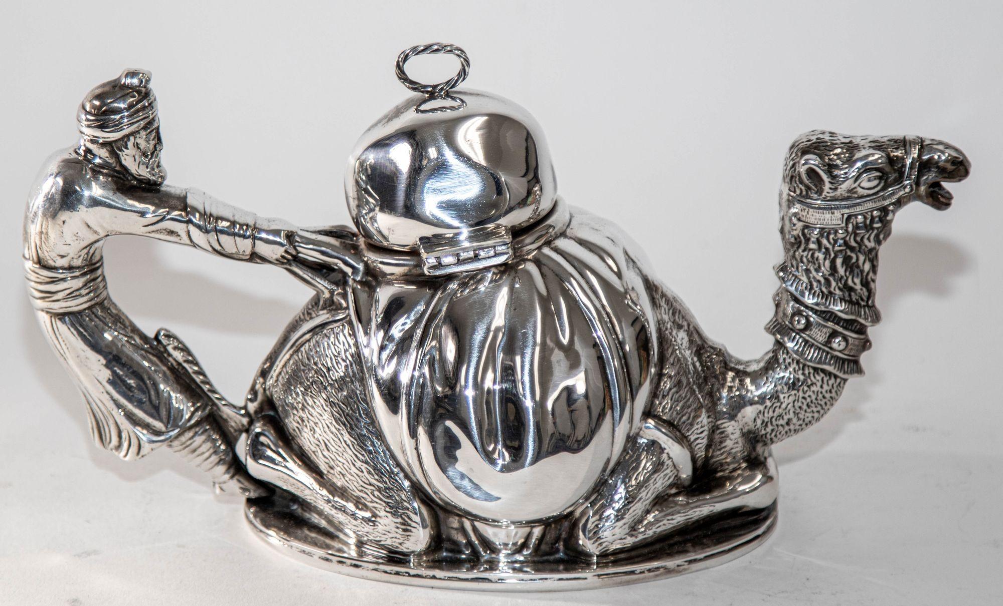 French silver-plated Karawan teapot in a camel form design: A Marvel by Mariage Frères, Paris.(French, founded 1854).it emerges from the storied ateliers of Mariage Frères, a renowned luxury Parisian tea company. Behd a captivating creation, a
