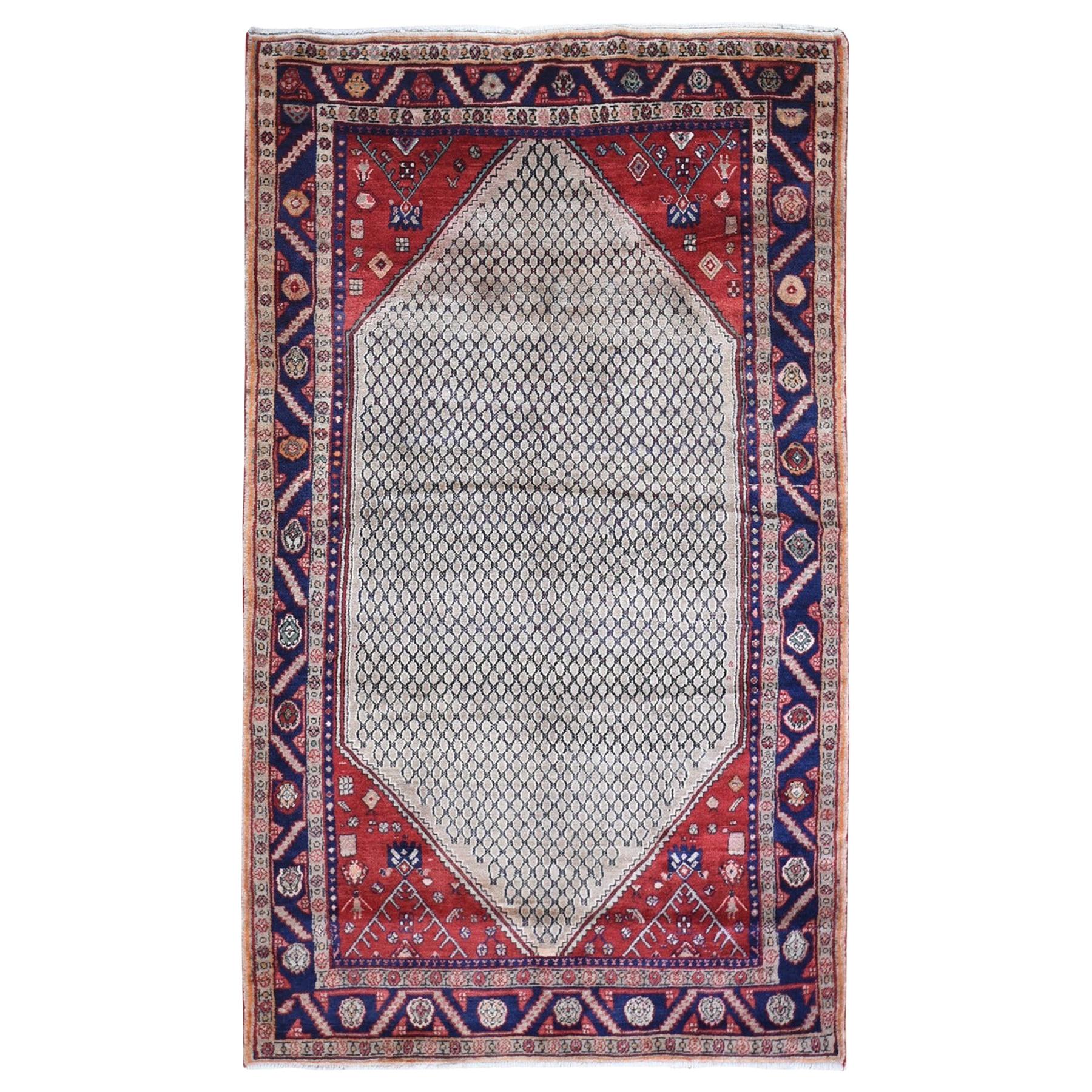 Handgeknüpfter Vintage-Teppich aus persischer Wolle mit Kamelhaar und offenem Feldmuster im Angebot