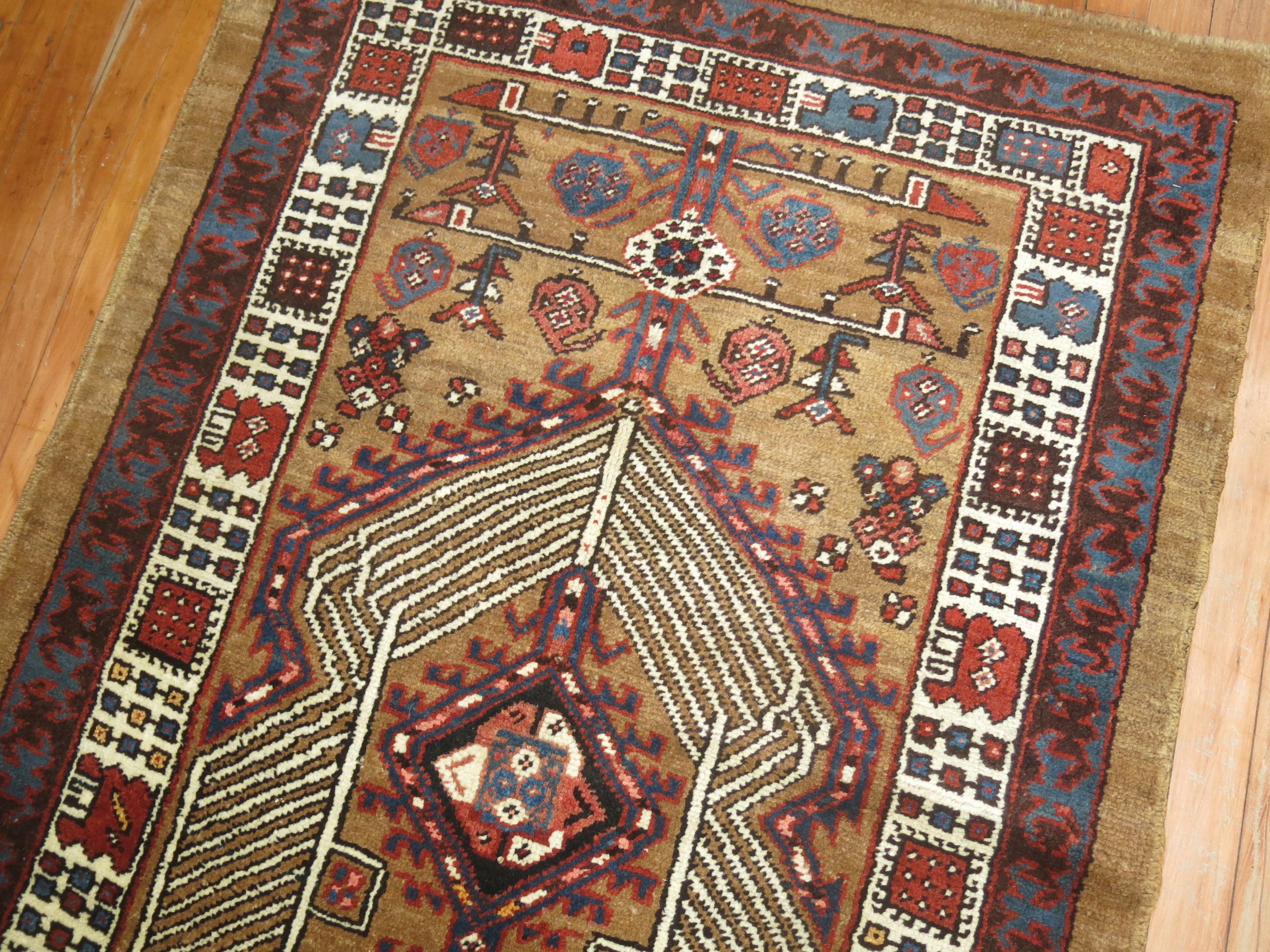 An early 20th century tribal Persian Serab runner with a geometric rustic color motif on a camel colored ground. Very versatile and sturdy. Dont be hesitant to use it in a high traffic area.

Measures: 3'4'' x 7'10''.
