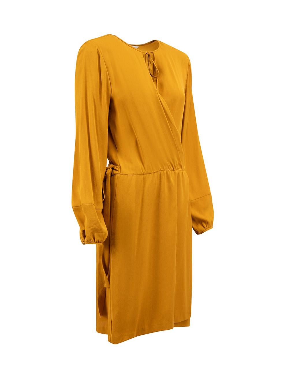 CONDITION is Good. Minor wear to dress is evident. Light wear to the front with dark marks and a pull to the weave at the rear on this used Diane Von Furstenberg designer resale item.



Details


Camel

Silk

Wrap dress

Midi

Long sleeve

Round