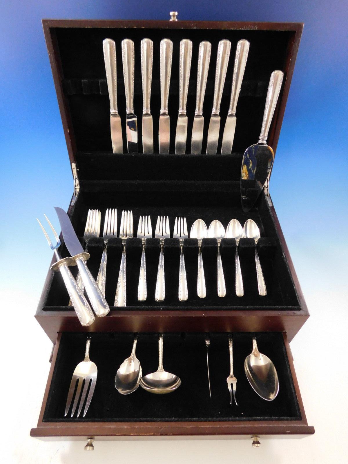 Camellia by Gorham sterling silver dinner size flatware set of 41 pieces. This set includes:

Eight dinner knives, 9 1/2
