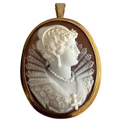 Cameo 19th century profile of a woman in gold frame