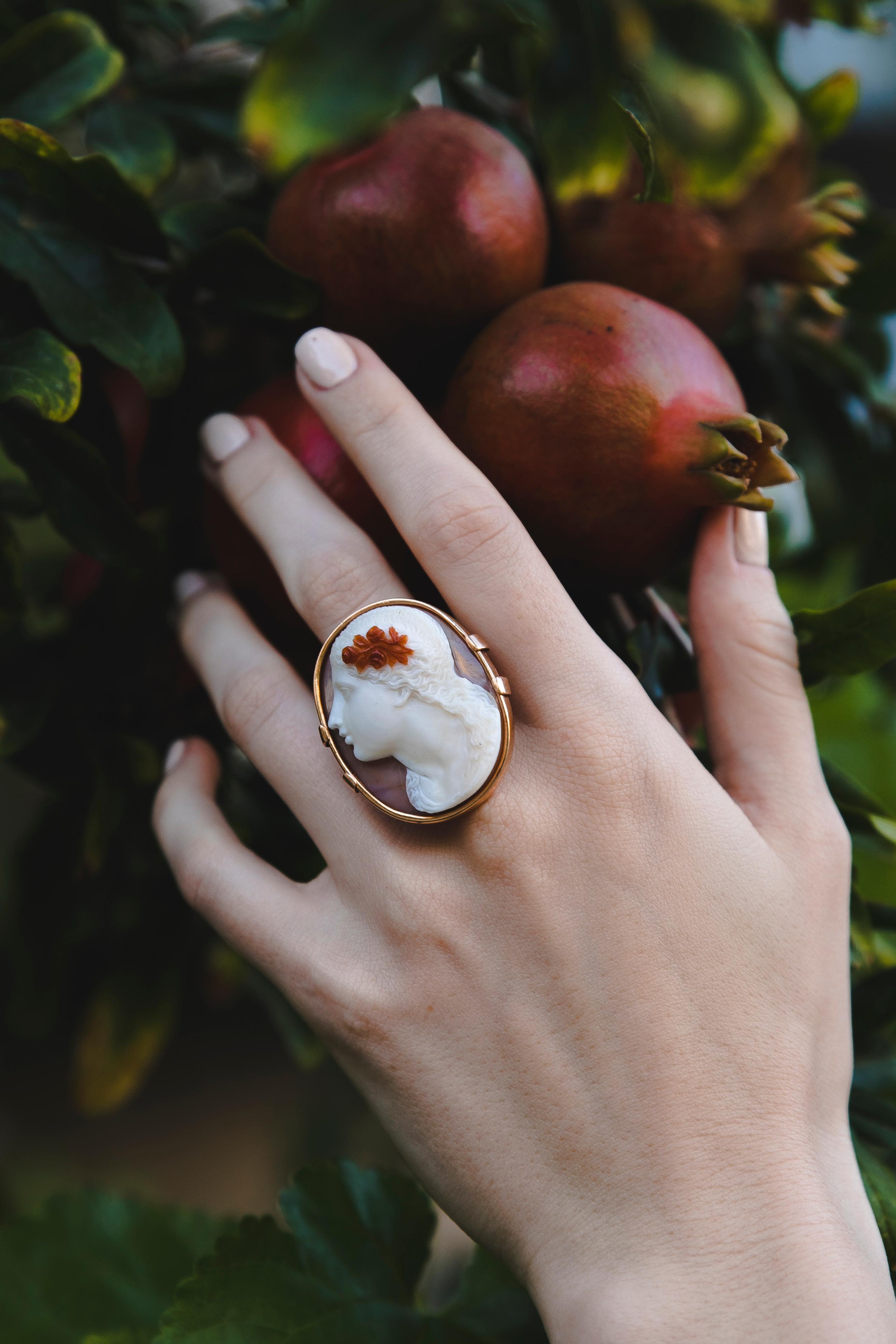 Carnelian 3 Layer Cameo Greek Revival Gold Ring. Created around the 1890.

Natural wonder meets human genius! Lady’s portrait ancient Greece style (Greek Revival) on a 3 Layer Cornelian Cameo. Created in 1890 it’s a testament to amazing jeweller