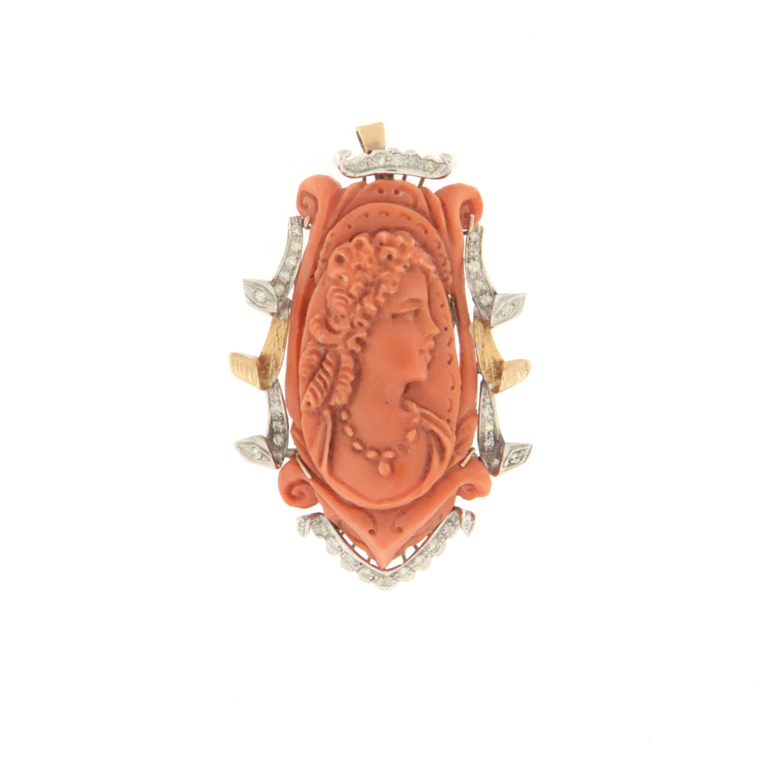 Antique brooch and pendant 14 karat yellow and white gold created entirely by hand with diamonds and in the center a beautiful engraved coral depicting a woman face.

Brooch total weight 35.30 grams
Diamonds weight 0.70 karat
(the price is without