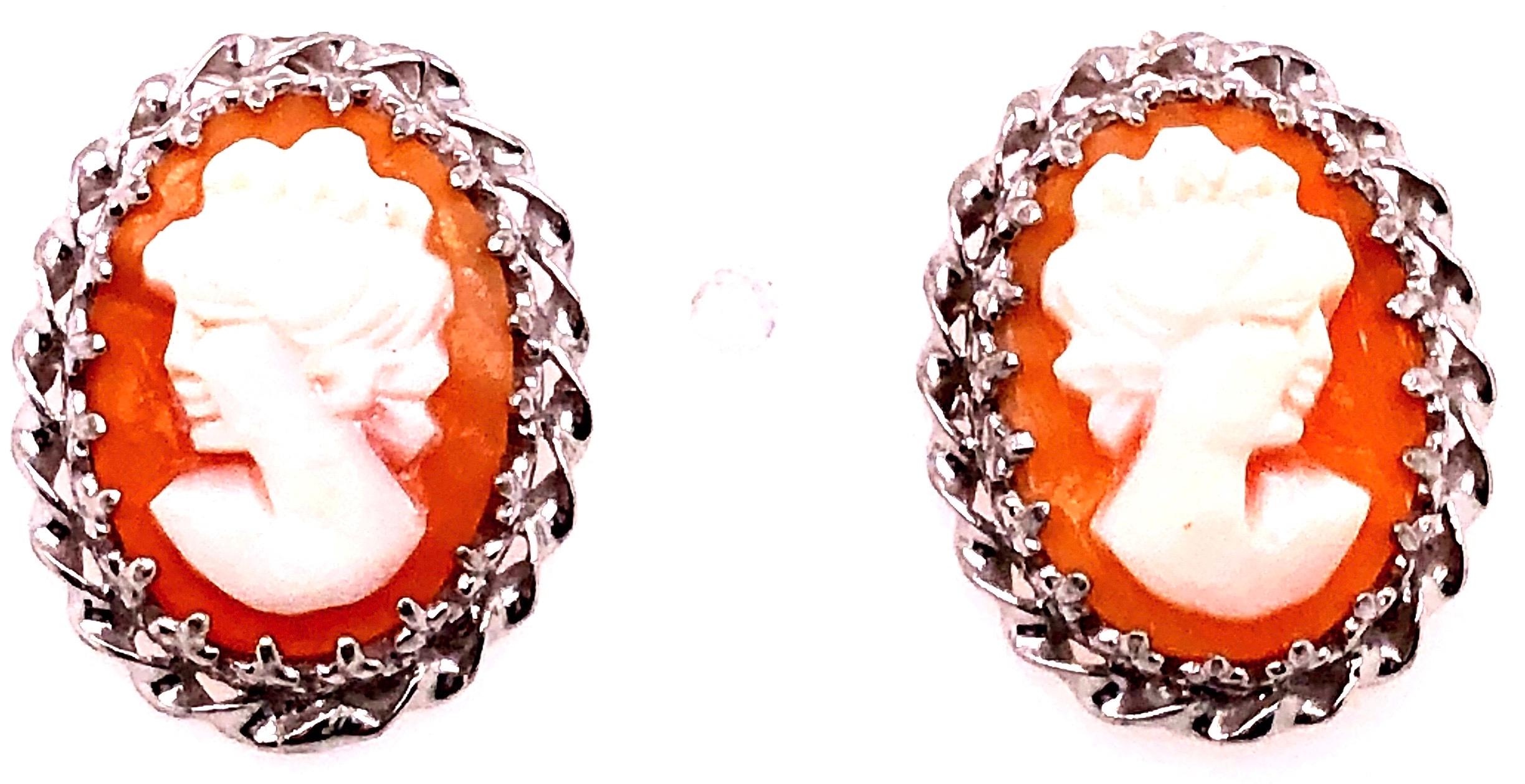 Cameo Earrings With Braided 14 Karat White Gold Border Post Back
5.61 total weight.