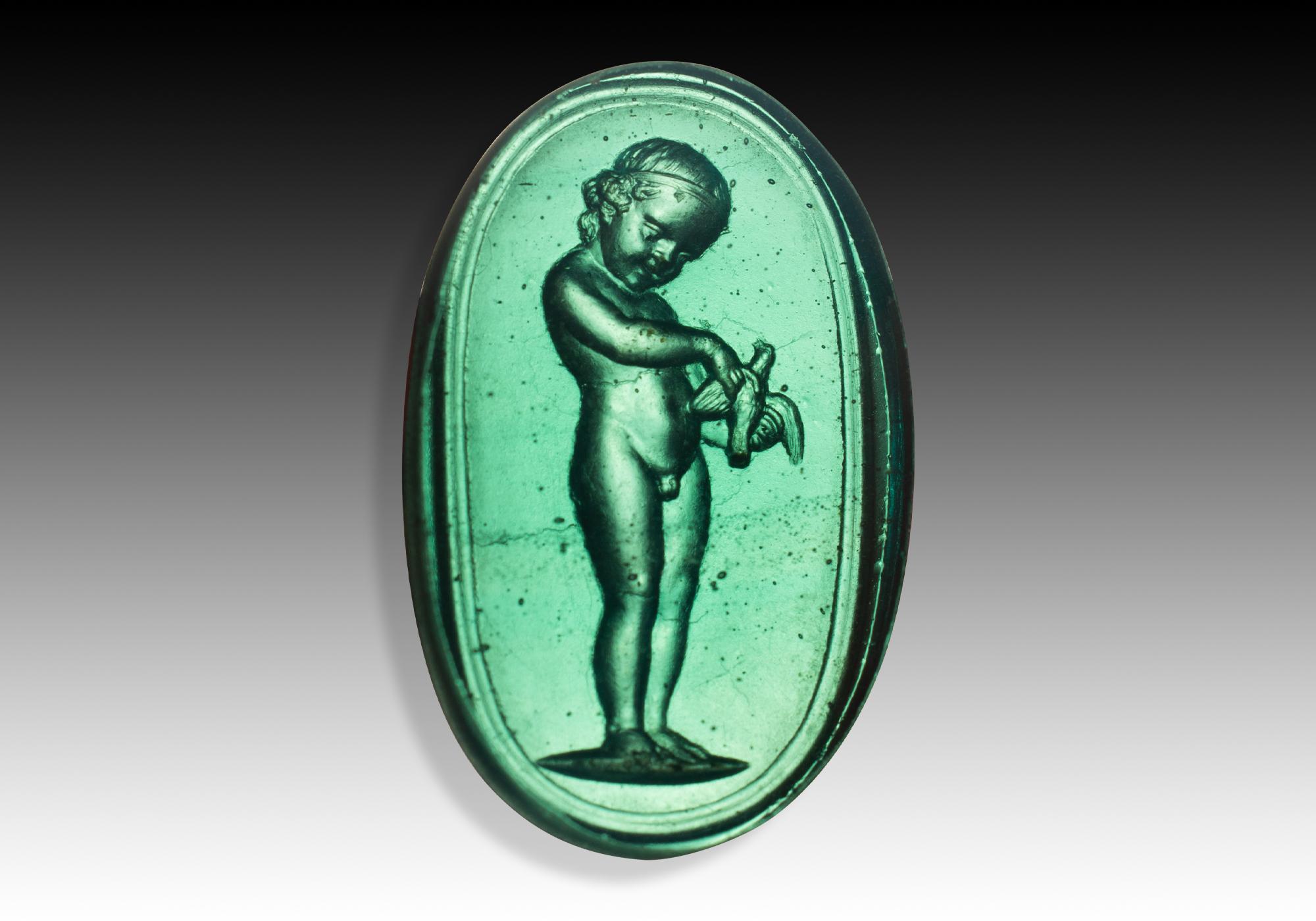 Neoclassical Revival Cameo or intaglio, Child with bird. Glass. Possibly Italy, 19th century.