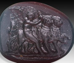 Cameo or intaglio, Cupid guiding lions. Glass. Possibly, Italy, 19th century.