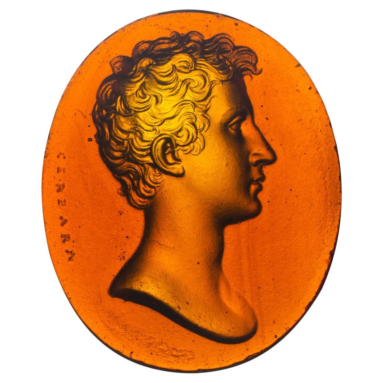 Cameo or intaglio, male profile. Glass. Possibly Italy, 19th century.