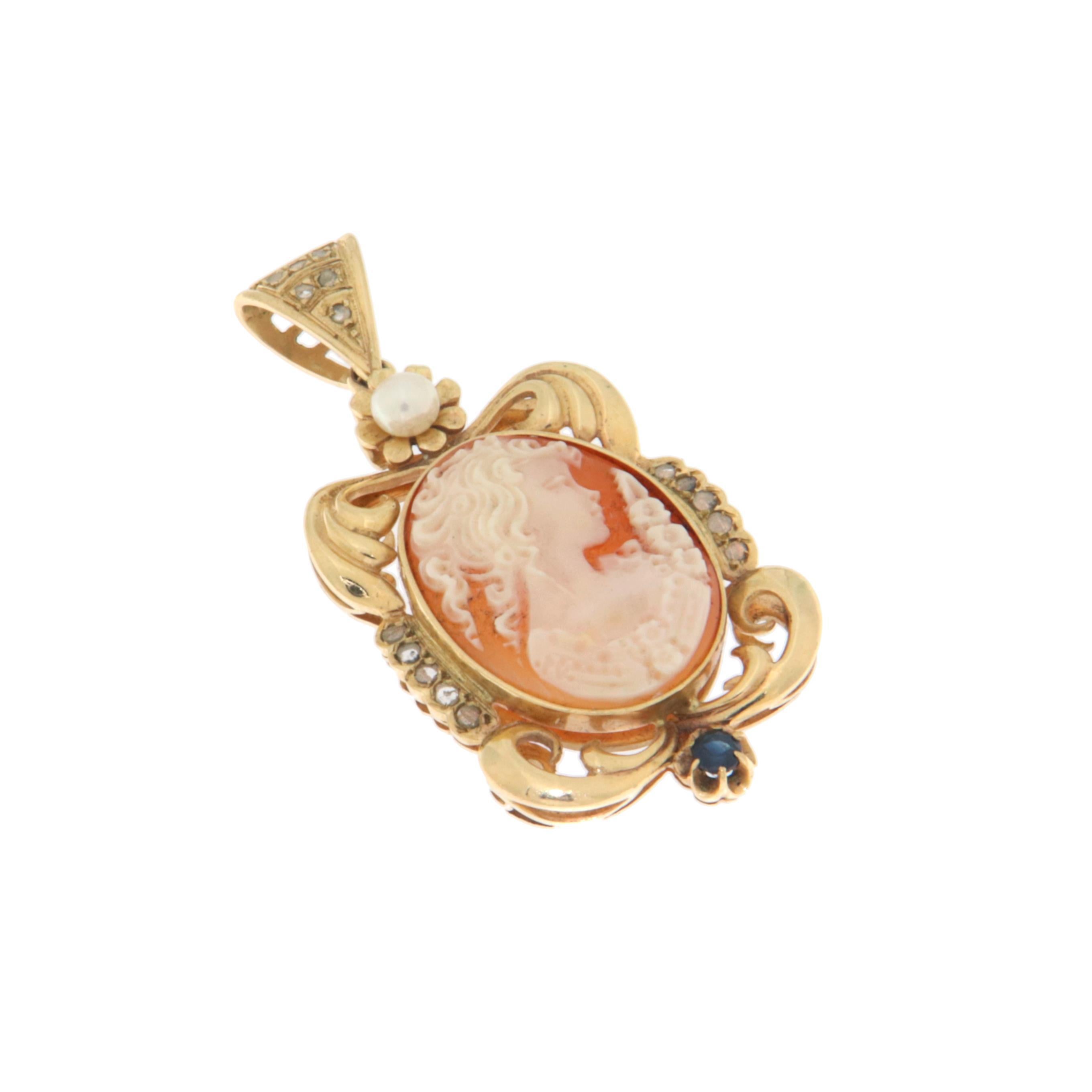 This elegant 12-karat yellow gold pendant is a timeless piece of jewelry that exudes sophistication and charm. At the heart of the design is a finely hand-carved cameo, depicting the delicate profile of a female figure, symbolizing grace and