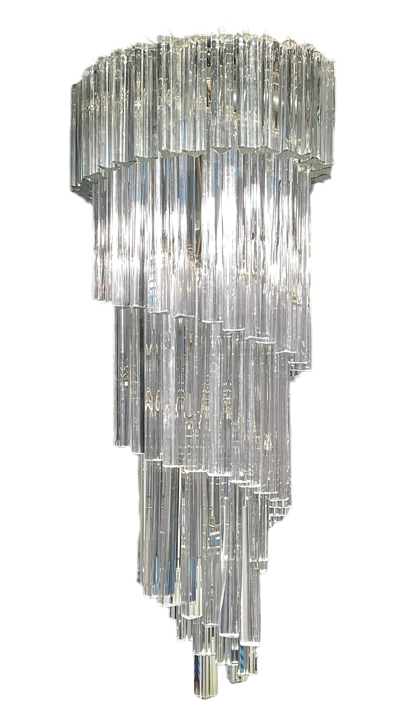 Camer crystal chandelier with chrome hardware. Murano, Italy, circa 1960. A lovely example of the classic spiral form, featuring quadrilobal Murano glass prisms --all in very fine condition. The chandelier is handcrafted, entirely manufactured in
