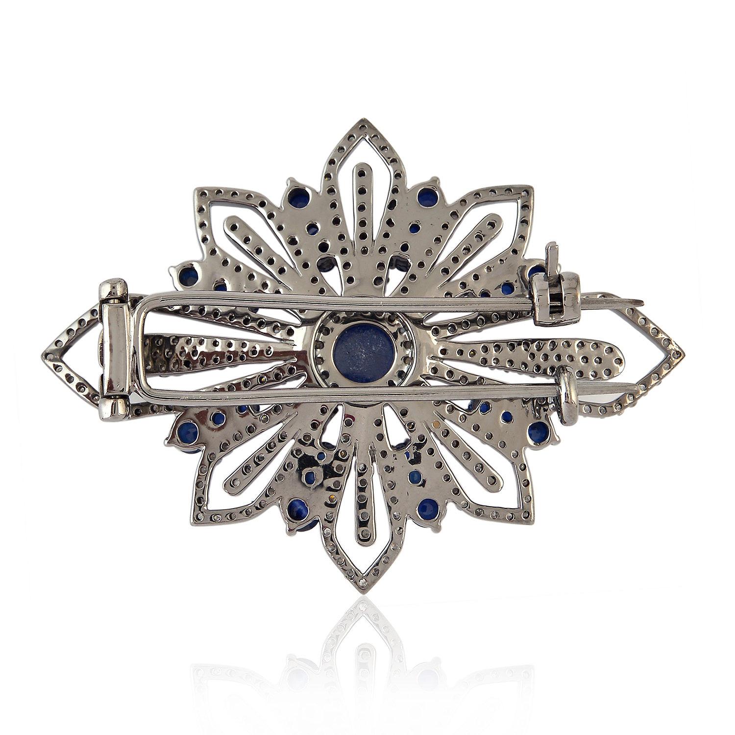 Cast in 18K gold and sterling silver. A stunning brooch hand set in 3.78 carats blue sapphire and 2.46 carats of sparkling diamonds.

FOLLOW  MEGHNA JEWELS storefront to view the latest collection & exclusive pieces.  Meghna Jewels is proudly rated