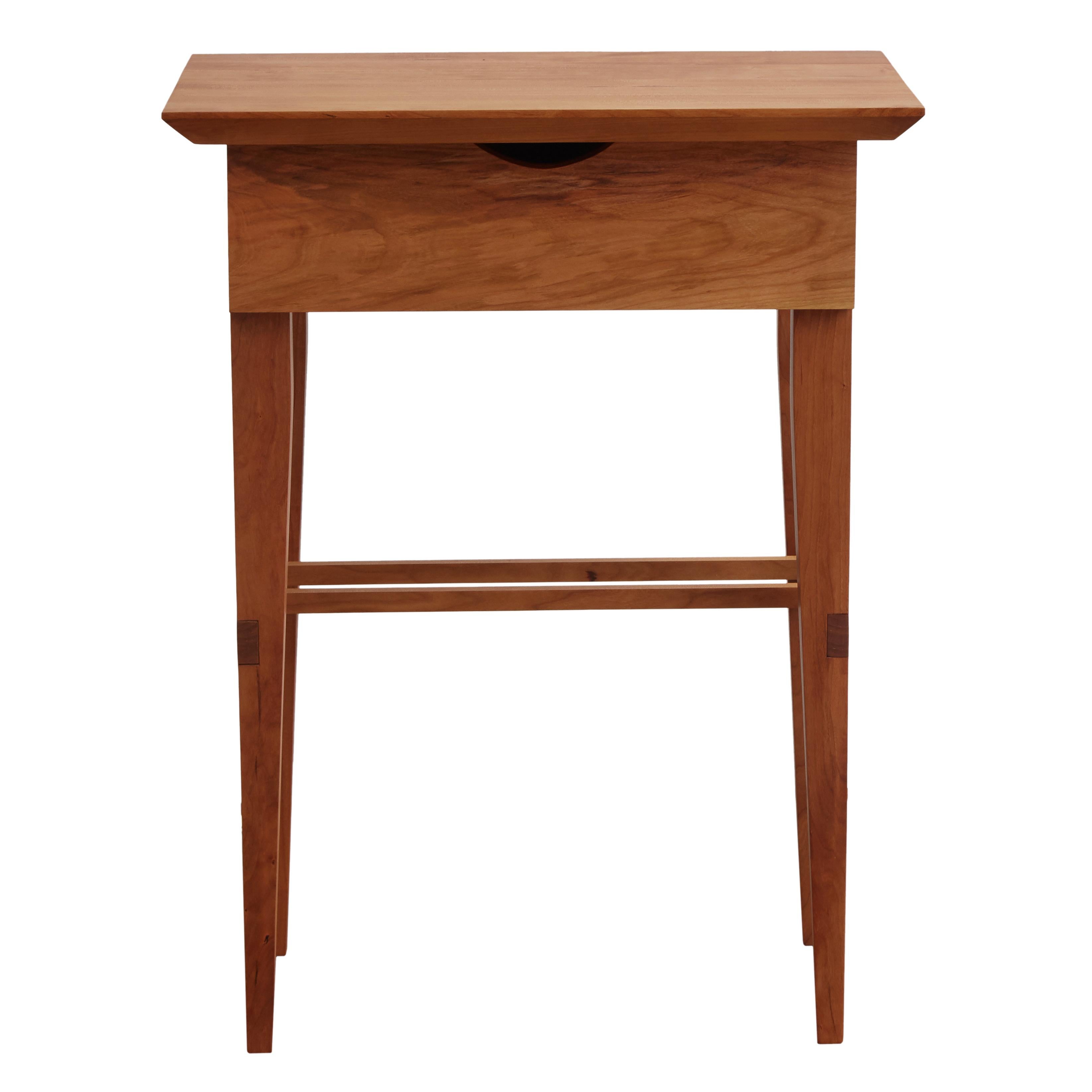 The Camilla Side Table compliments contemporary, mid-century and Shaker design, and is suitable as a nightstand, end table, or sofa table. Each joinery-intensive piece has a small solid wood slatted bottom pen drawer and book shelf, and is sold