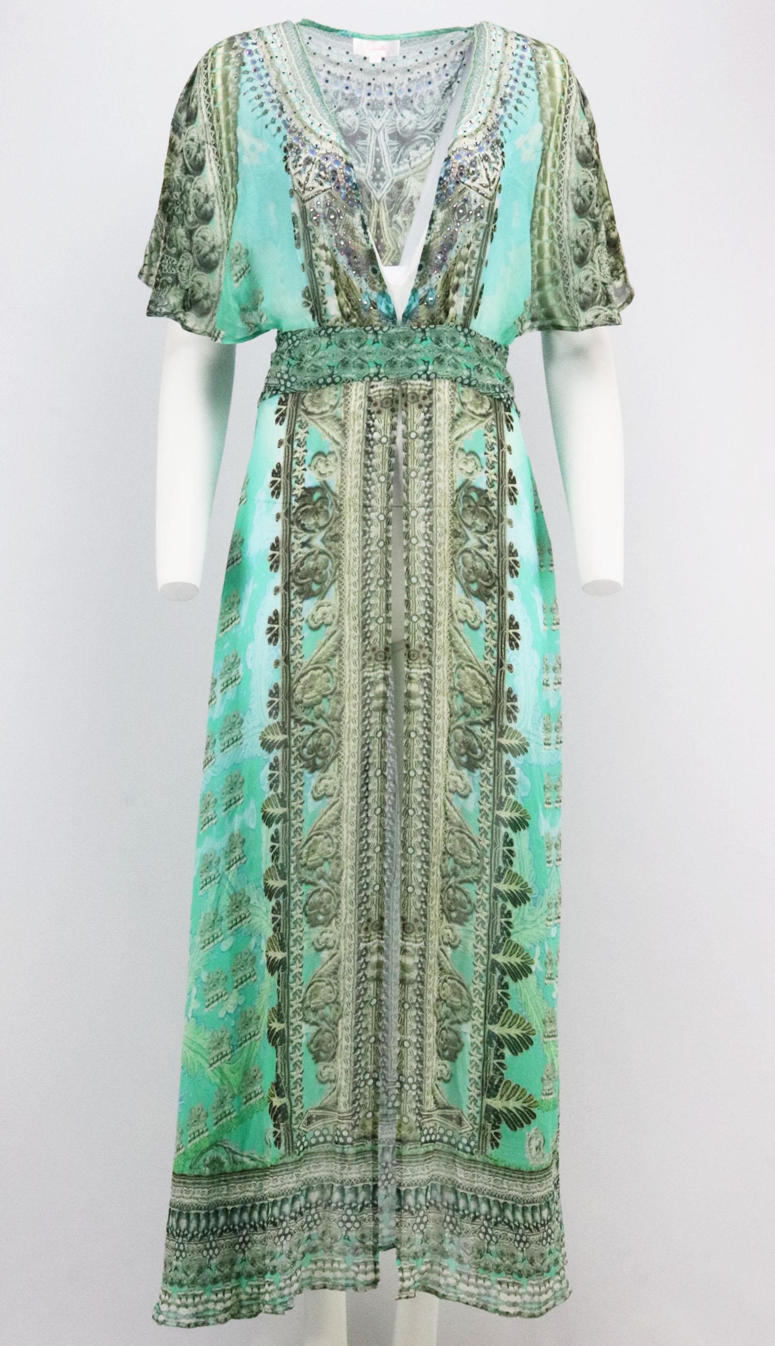 Camilla's signature motifs fuse the label's bohemian spirit with a touch of glamour and elegance, made from silk-georgette, this kaftan is printed featuring vibrant green and blue florals, it's illuminated by sparkling crystals, nipped-in waist and
