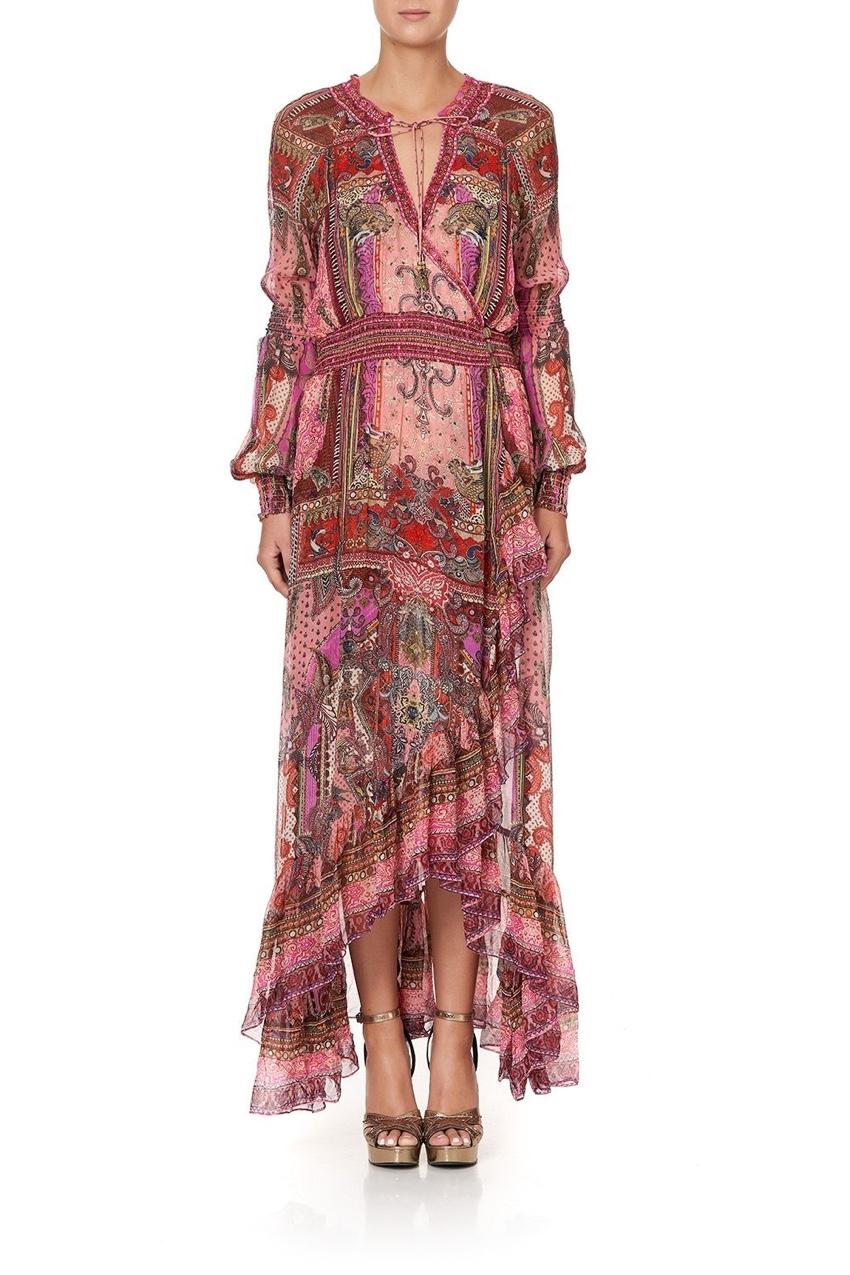 Camilla Lotus Lovers Blouson Sleeve Wrap Dress 

A mesmerising elegant silhouette enchanted by a dreamy fairytale print, the Lotus Lovers Blouson Sleeve Wrap Dress is crafted in a radiating structural silk print with intricate detailing. This floaty